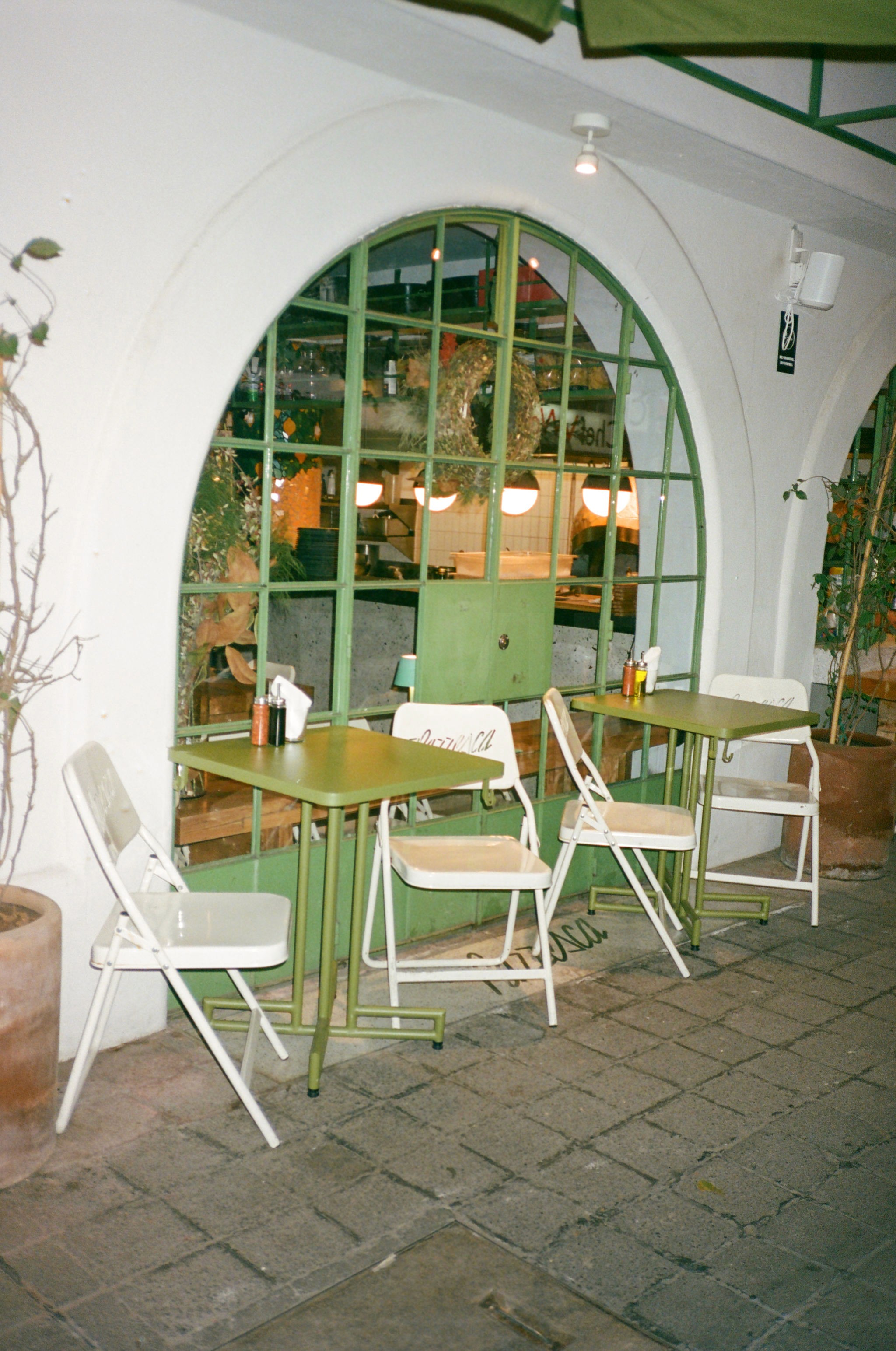 Woman with red hair covering mouth with hair