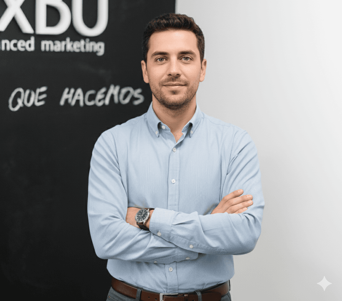 Male scientist in a white lab coat standing confidently in a modern hydroponic lab with pink grow lights and rows of leafy greens.