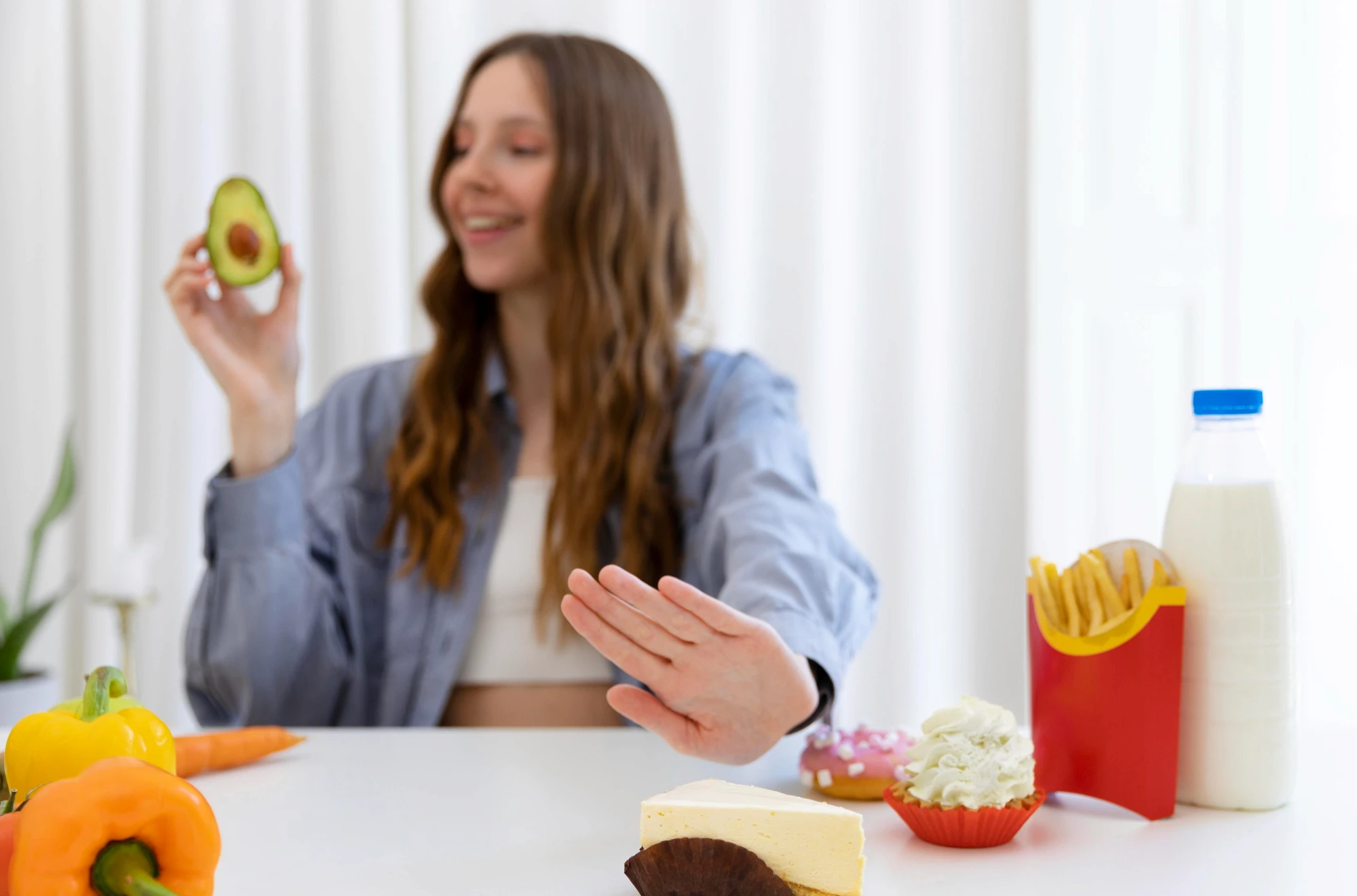 Woman eating high-calorie foods to gain weight healthily, representing balanced nutrition for muscle growth