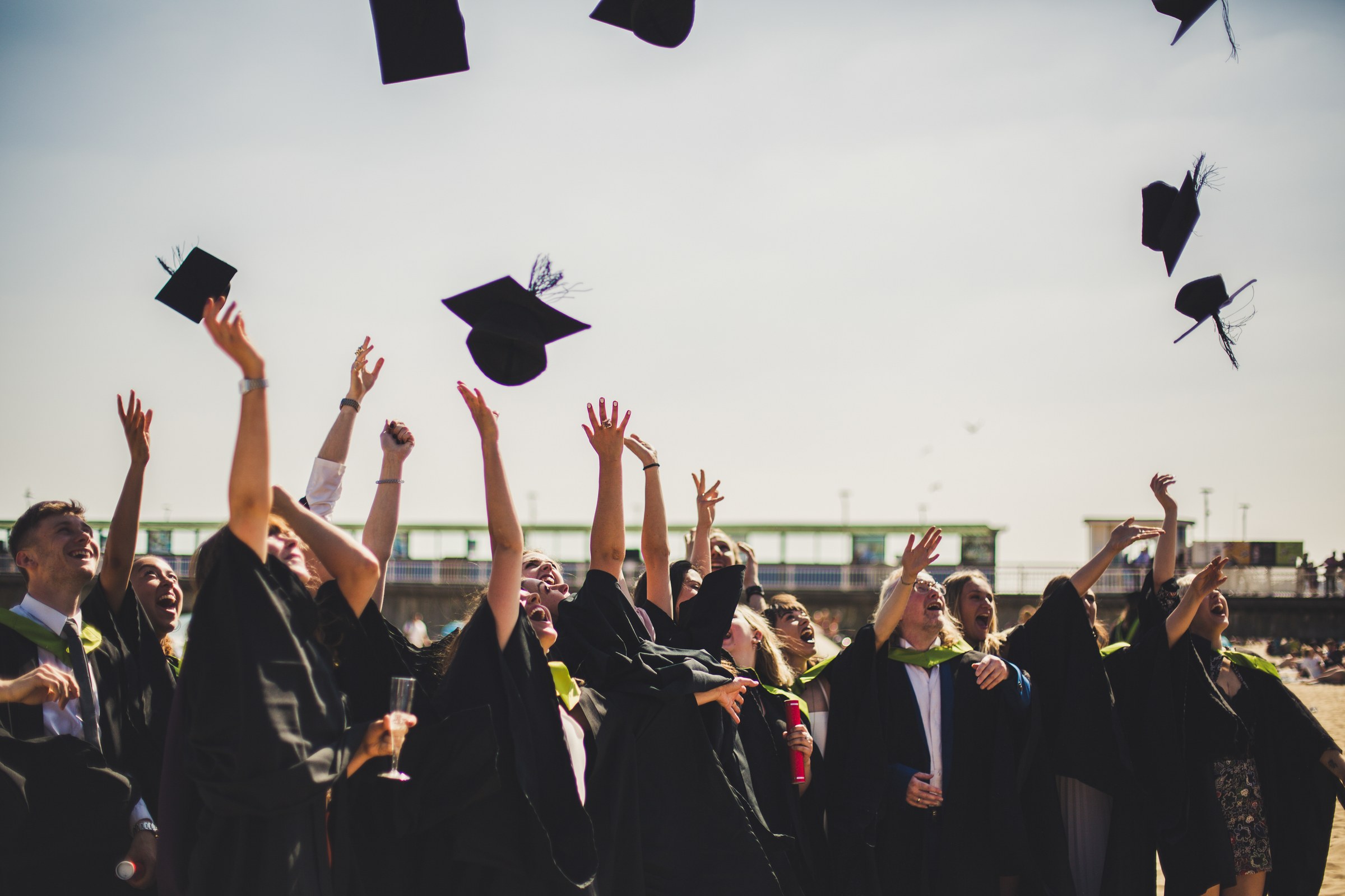 EVENTS · Graduates celebrating together.