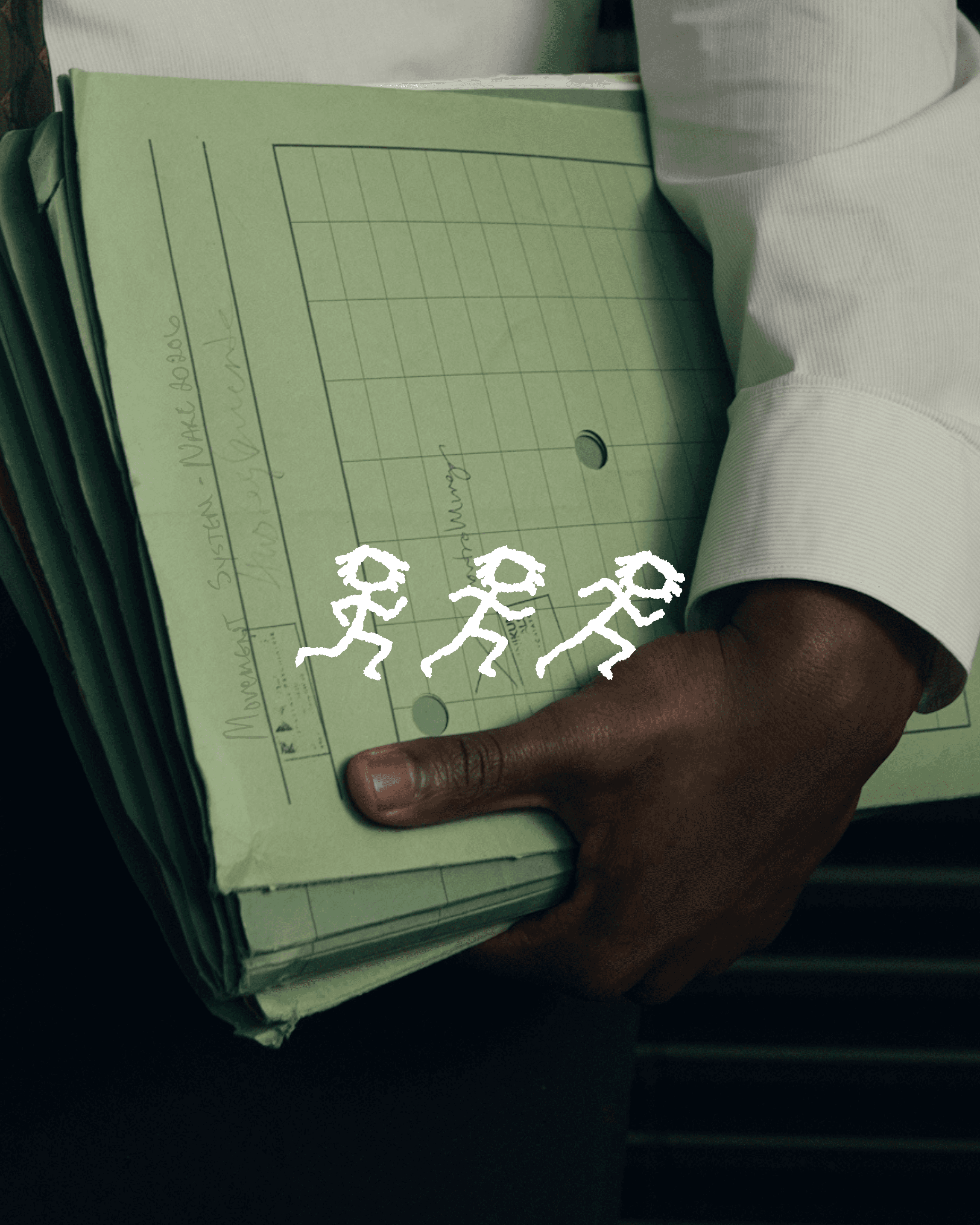 Three running men stick figures overlaid over a photo of a hand holding files