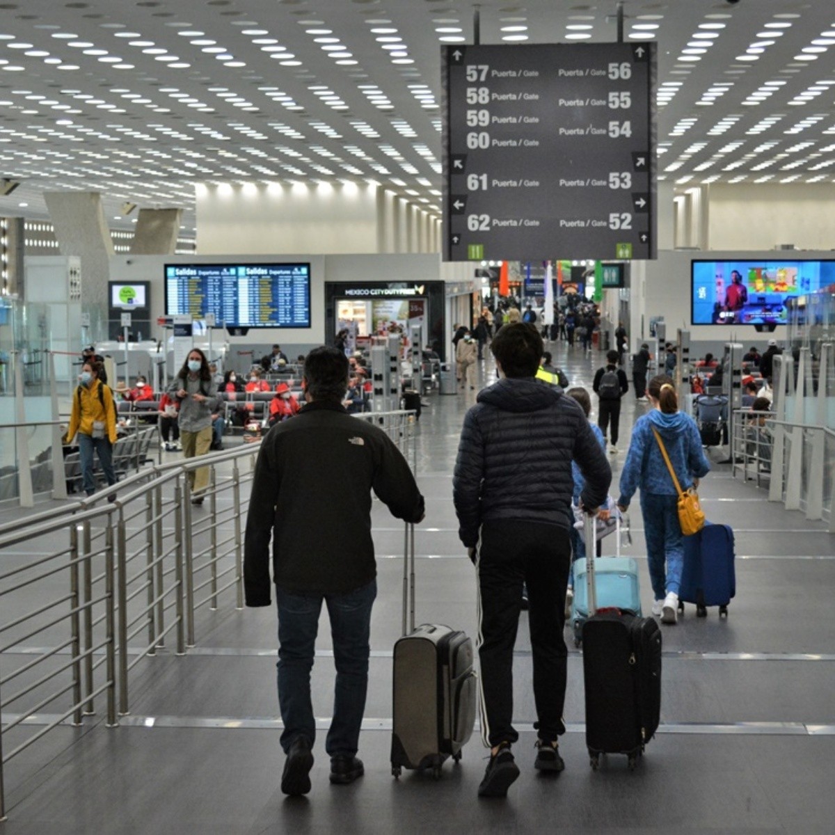 People waling in terminal airport