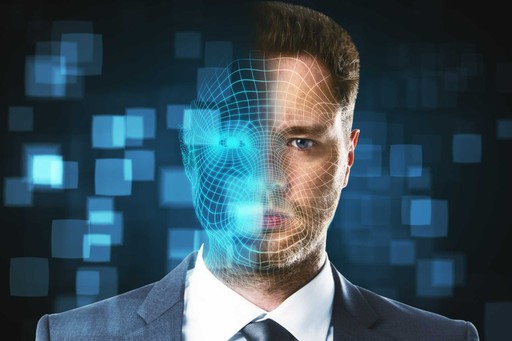 A man in a suit has a half-transparent face, surrounded by digital pixels and blue light.
