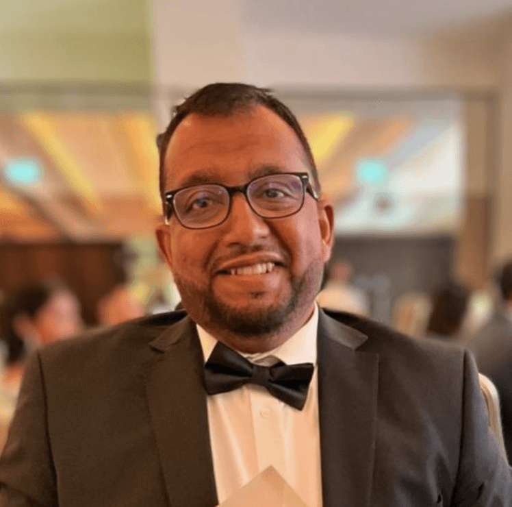 woman in white crew neck shirt smiling