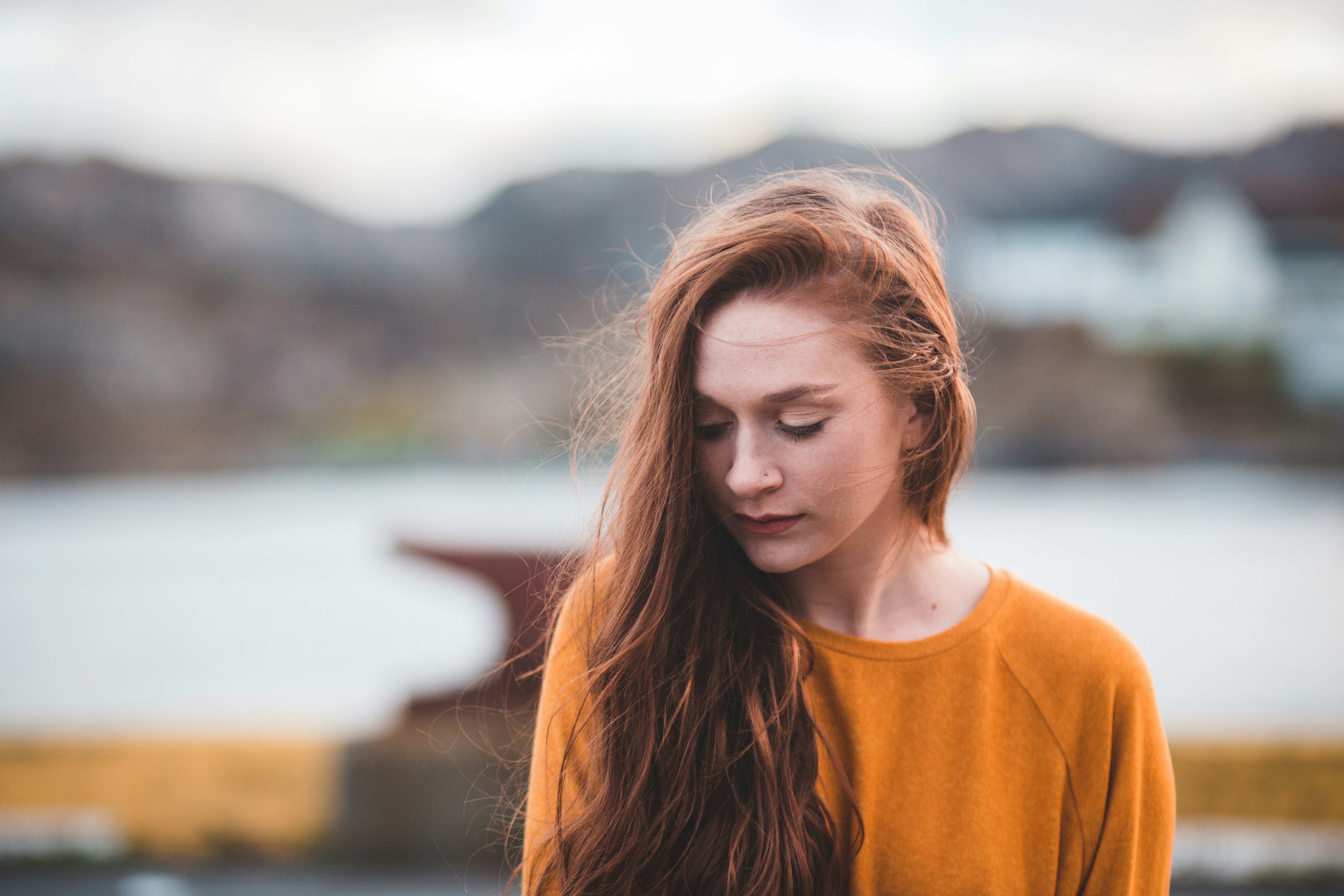 woman enjoying the weather - Cozy Fall Outfits