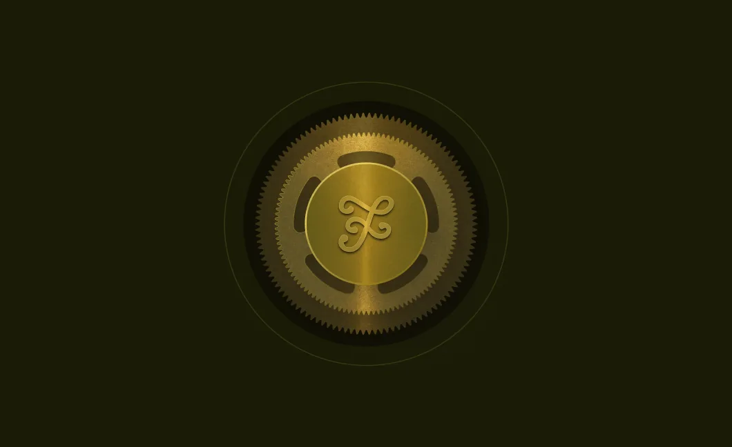 Gold Figr monogram coin on dark green
