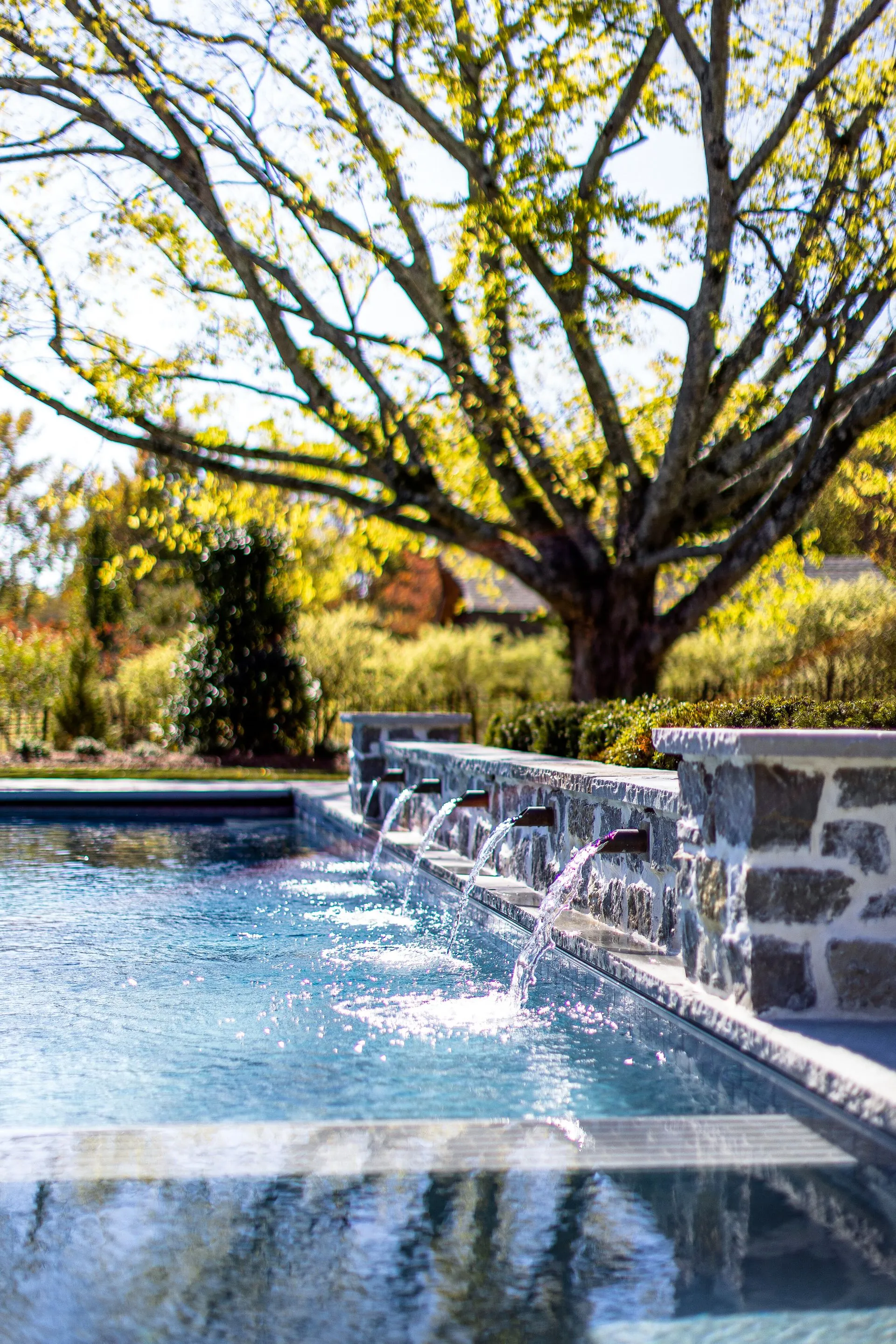 brown wooden barrels on brown brick wall
