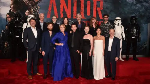 Full Andor cast dressed up in suits and dresses at the red carpet of a premiere