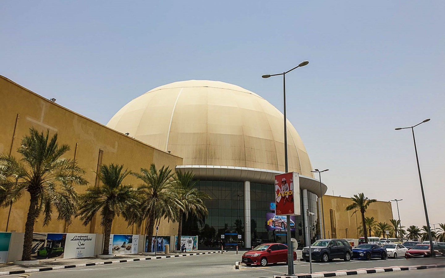 Wide view of the GEMS FirstPoint School campus located within the Dubailand Residence Complex.