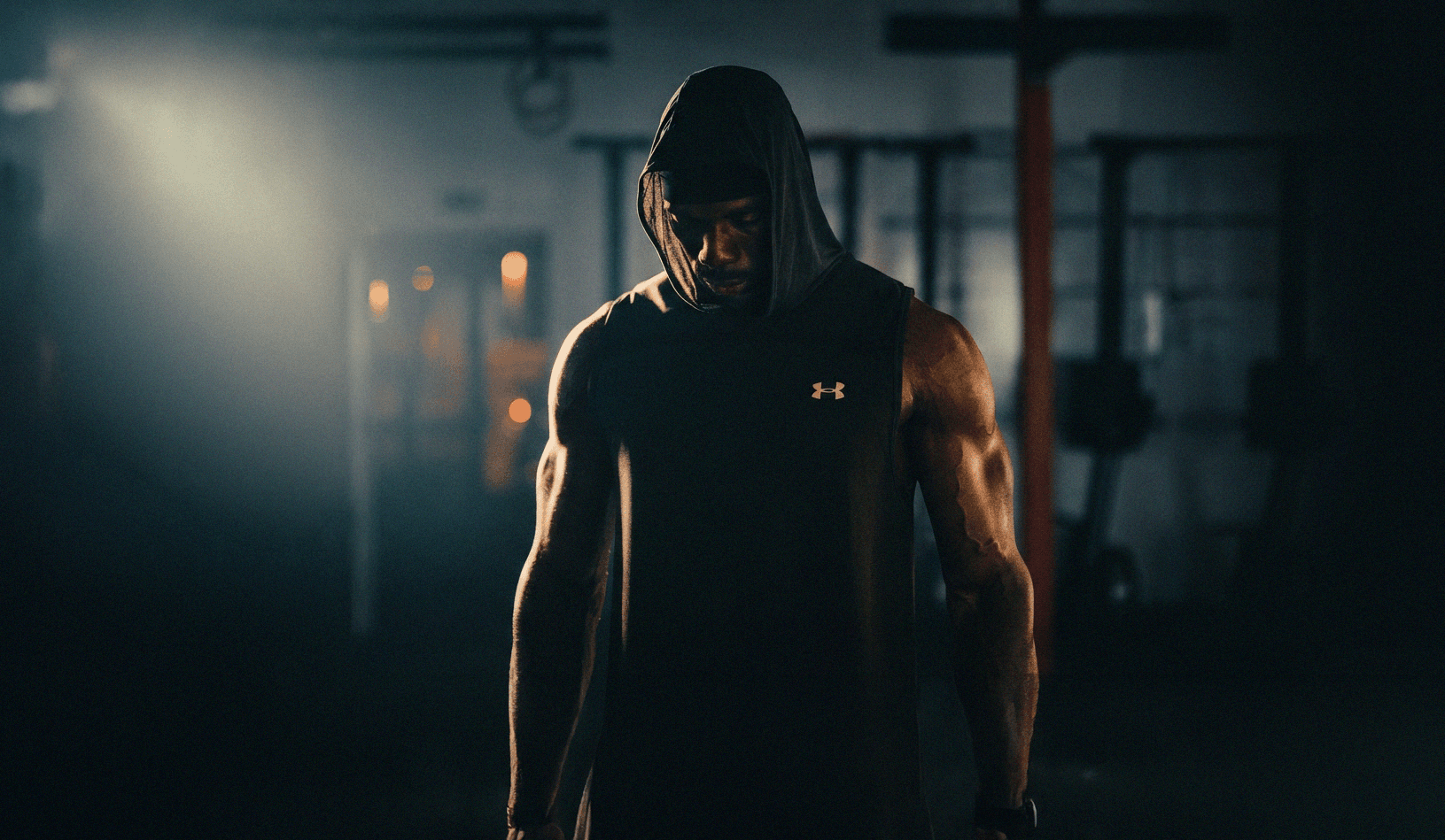 man in black tank top wearing black headphones