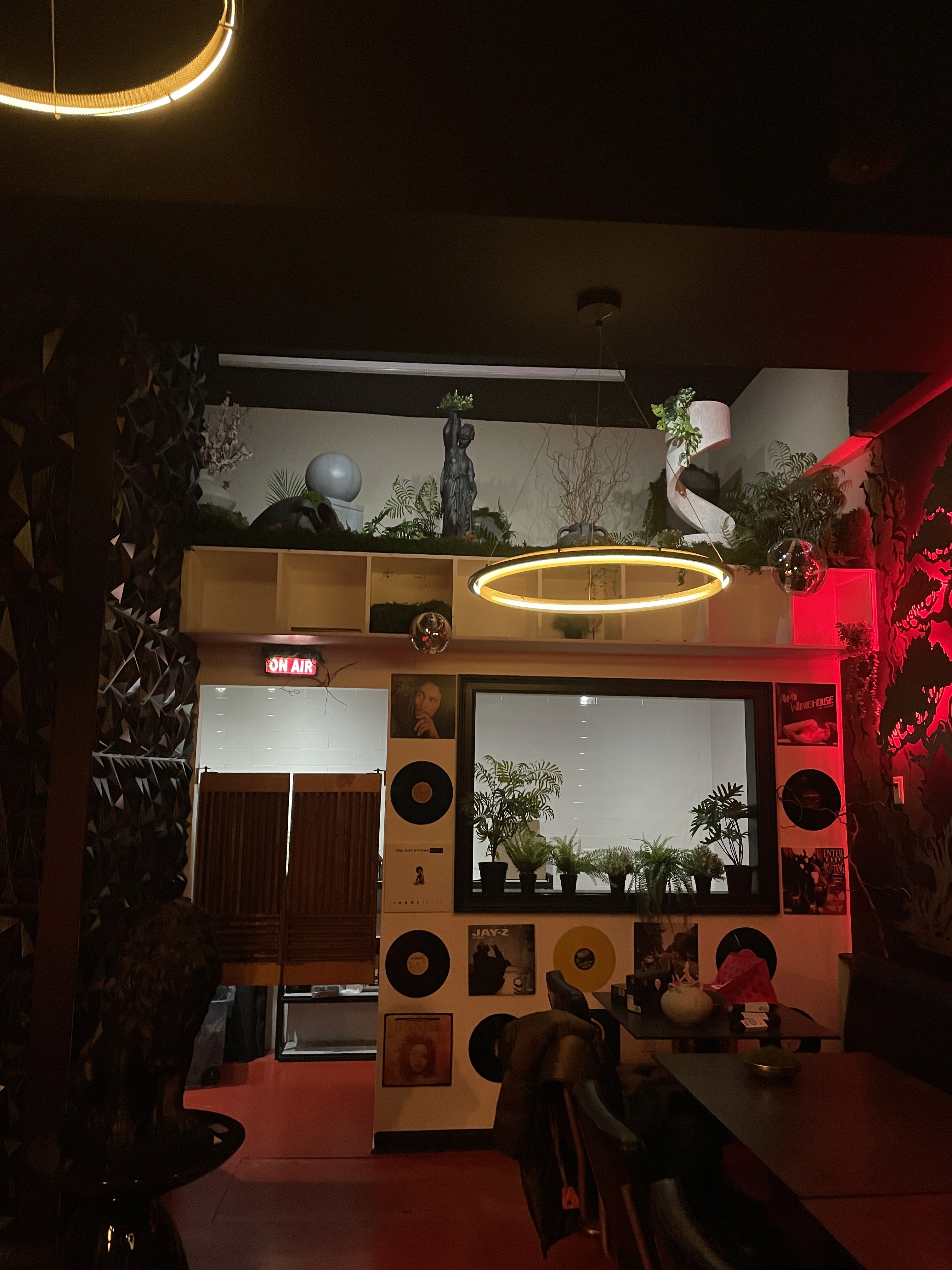 Lamp placed behind sofa cushions