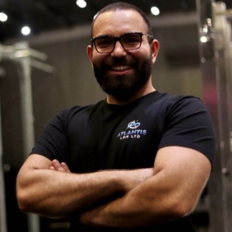 person sitting in a chair in front of a man