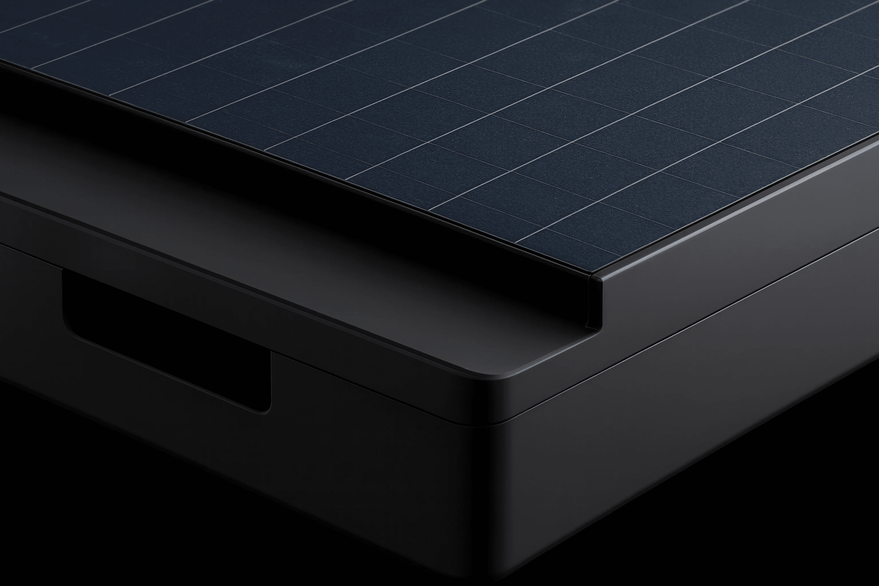 Close up of black industrial unit with grid patterned top surface