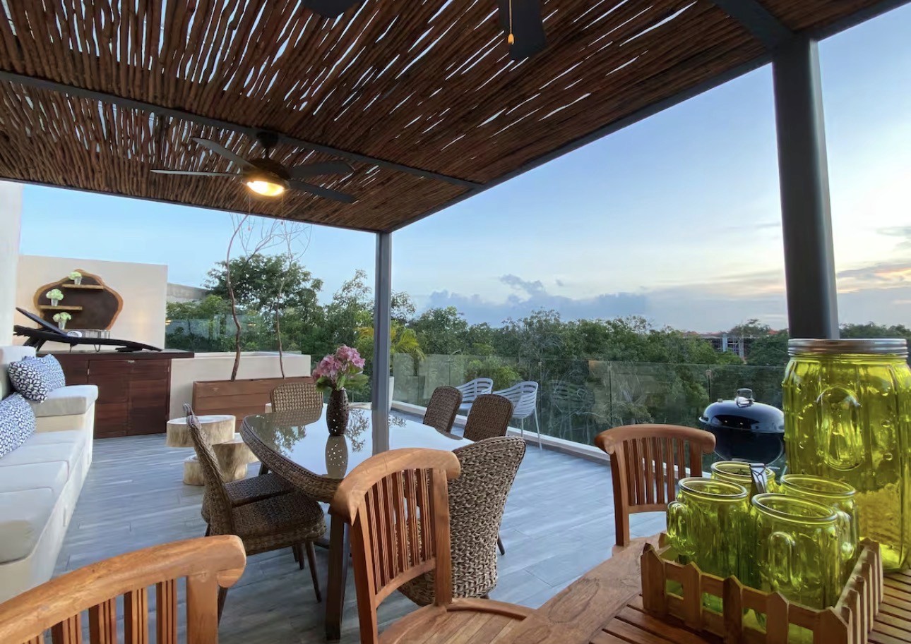 Cozy sleeping bed high in the mountain with a sunset view