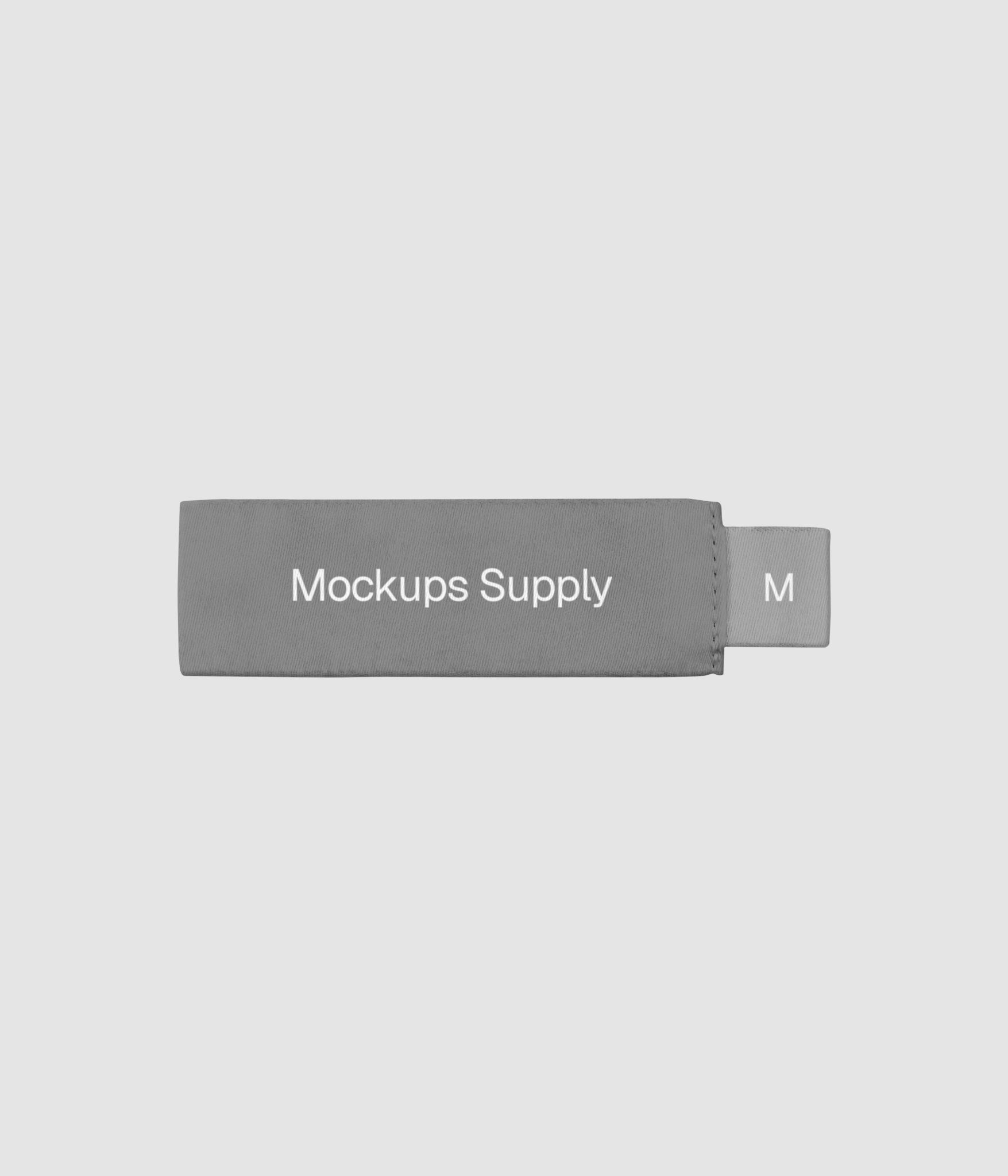 Close up of a side tab polyester clothing label mockup download on Mockups Supply