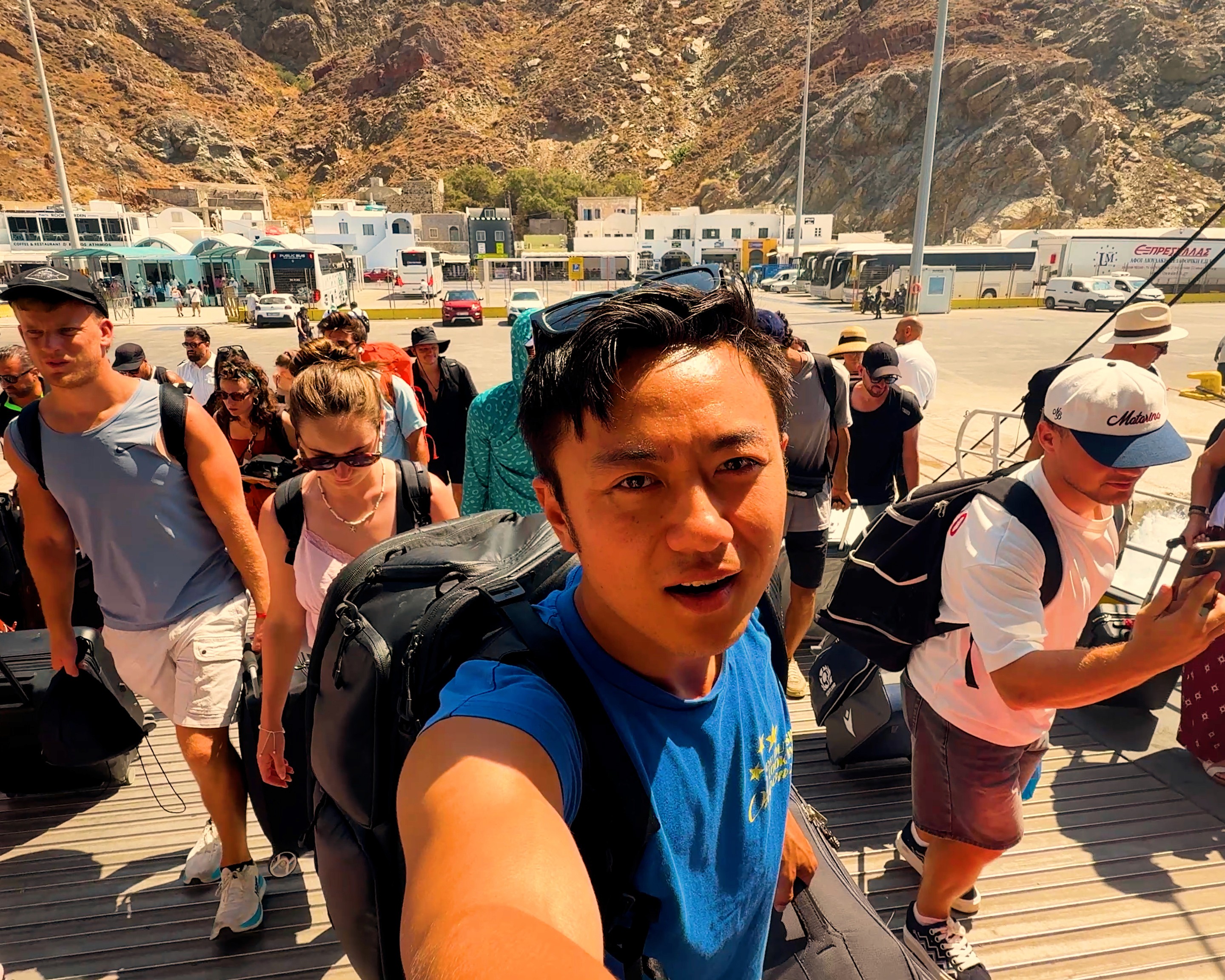 Crowded ferry boarding area from Santorini to Milos