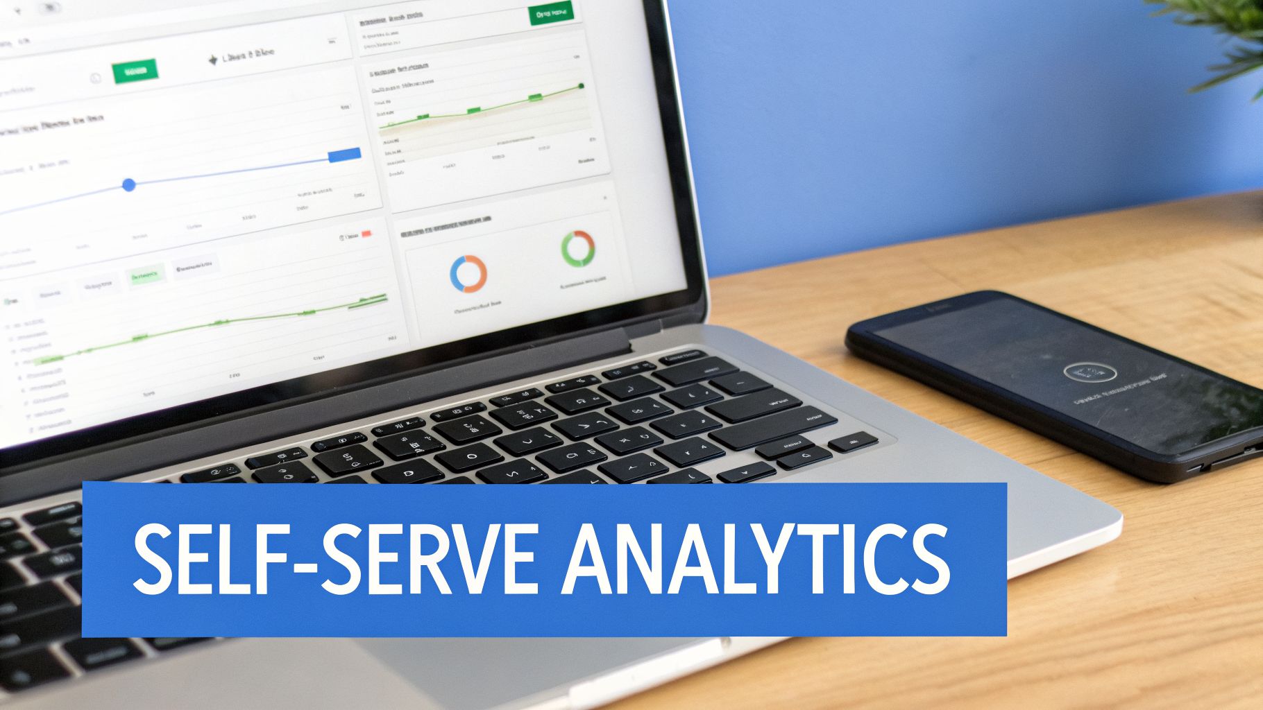 A laptop displaying self-serve analytics dashboards with charts and graphs, alongside a smartphone.