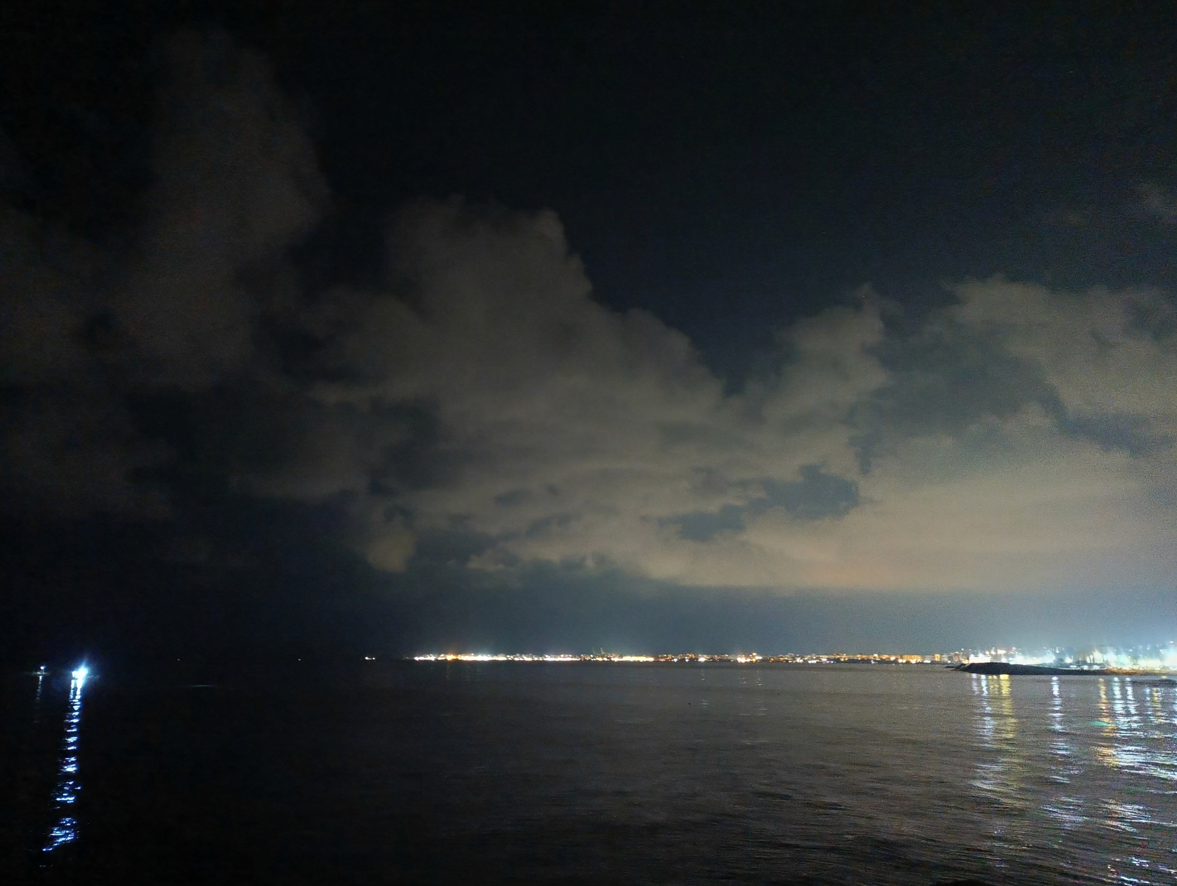 Cloudy sky over the sea at night. NORTH LEBANON-TRIPOLI 06-10-2024