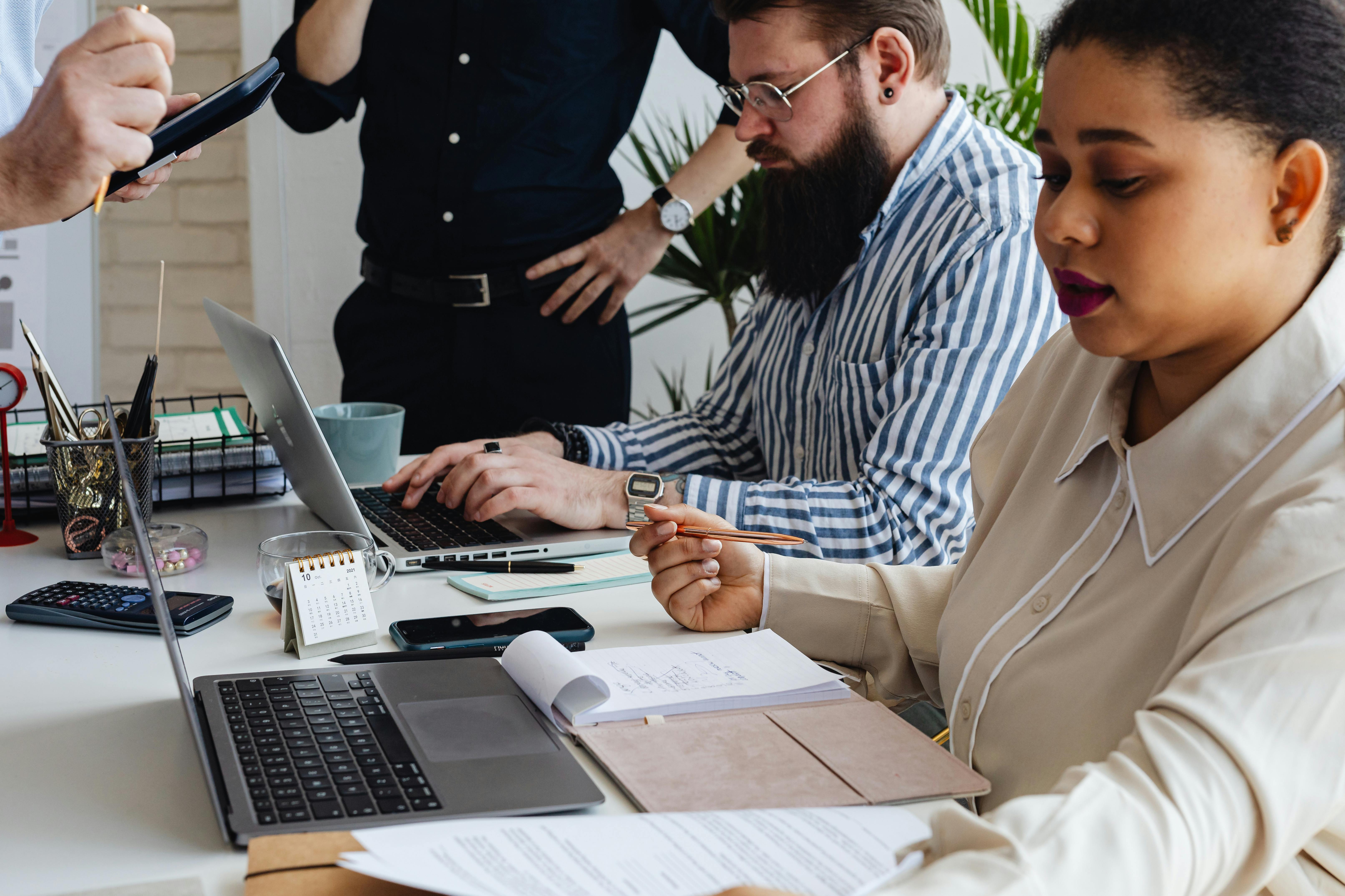 People working using key elements of a successful outreach plan 