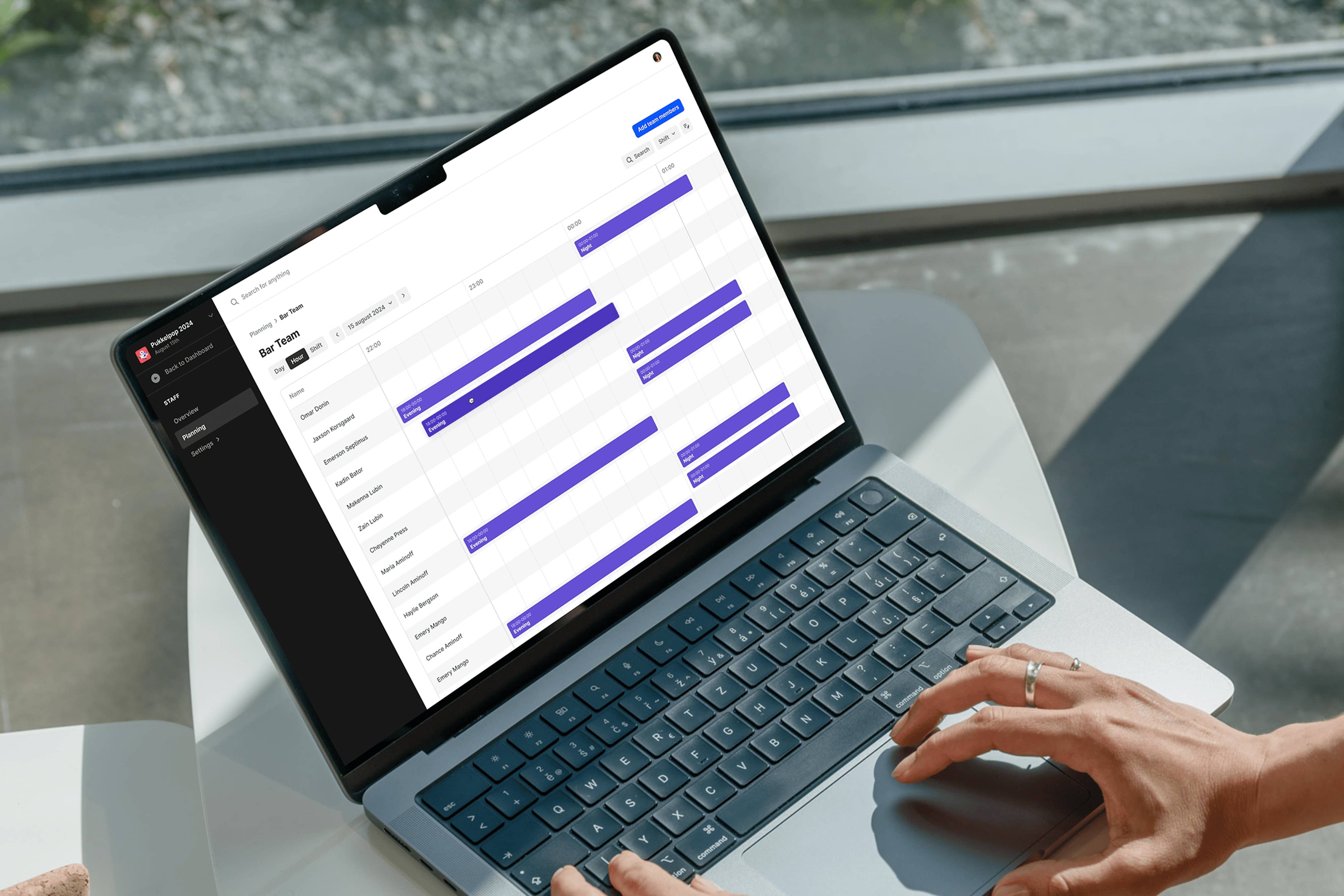 Web application showing staff scheduling timeline