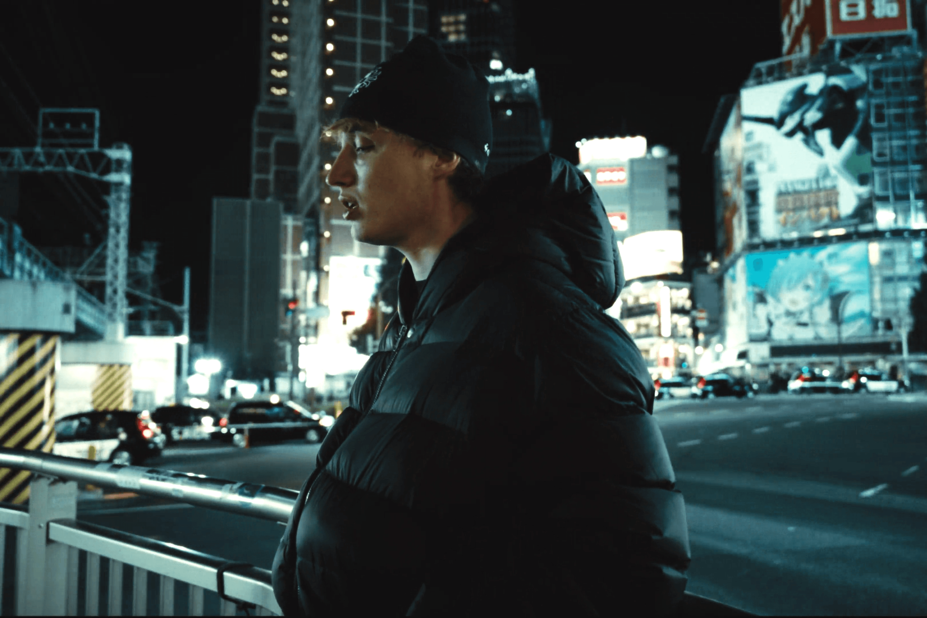 Isac Elliot Singer Finnish Music Music Video man standing in city streetwear beanie