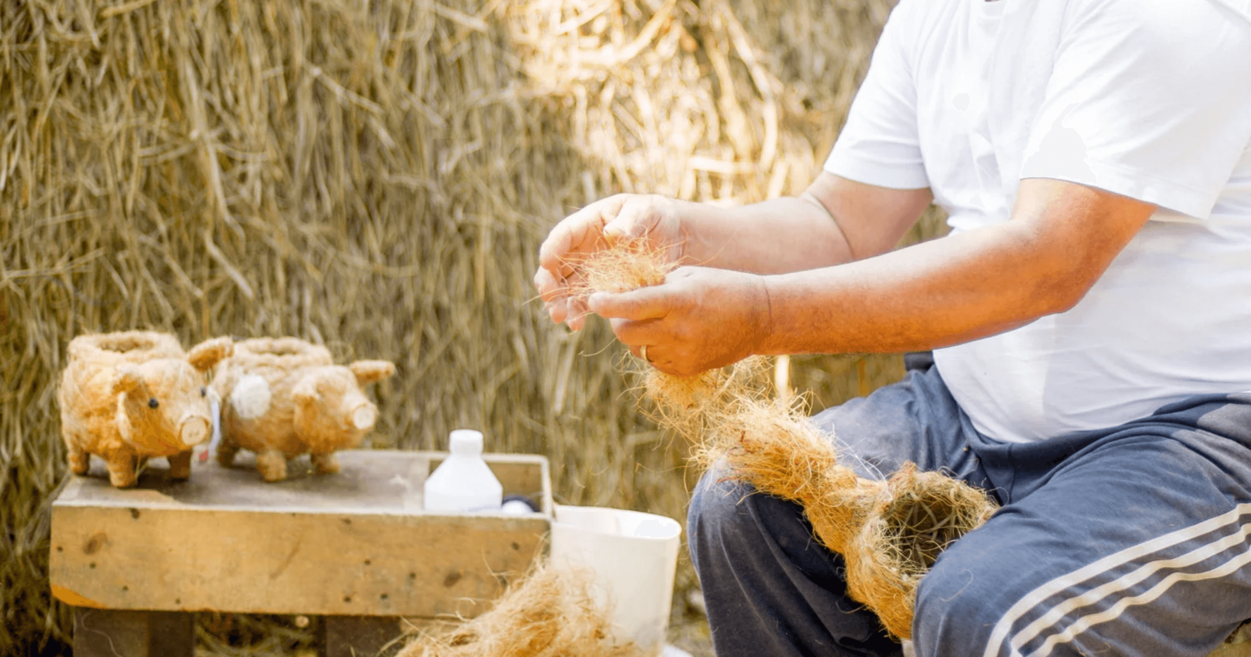 A Filipino artisan designing and making an animal planter