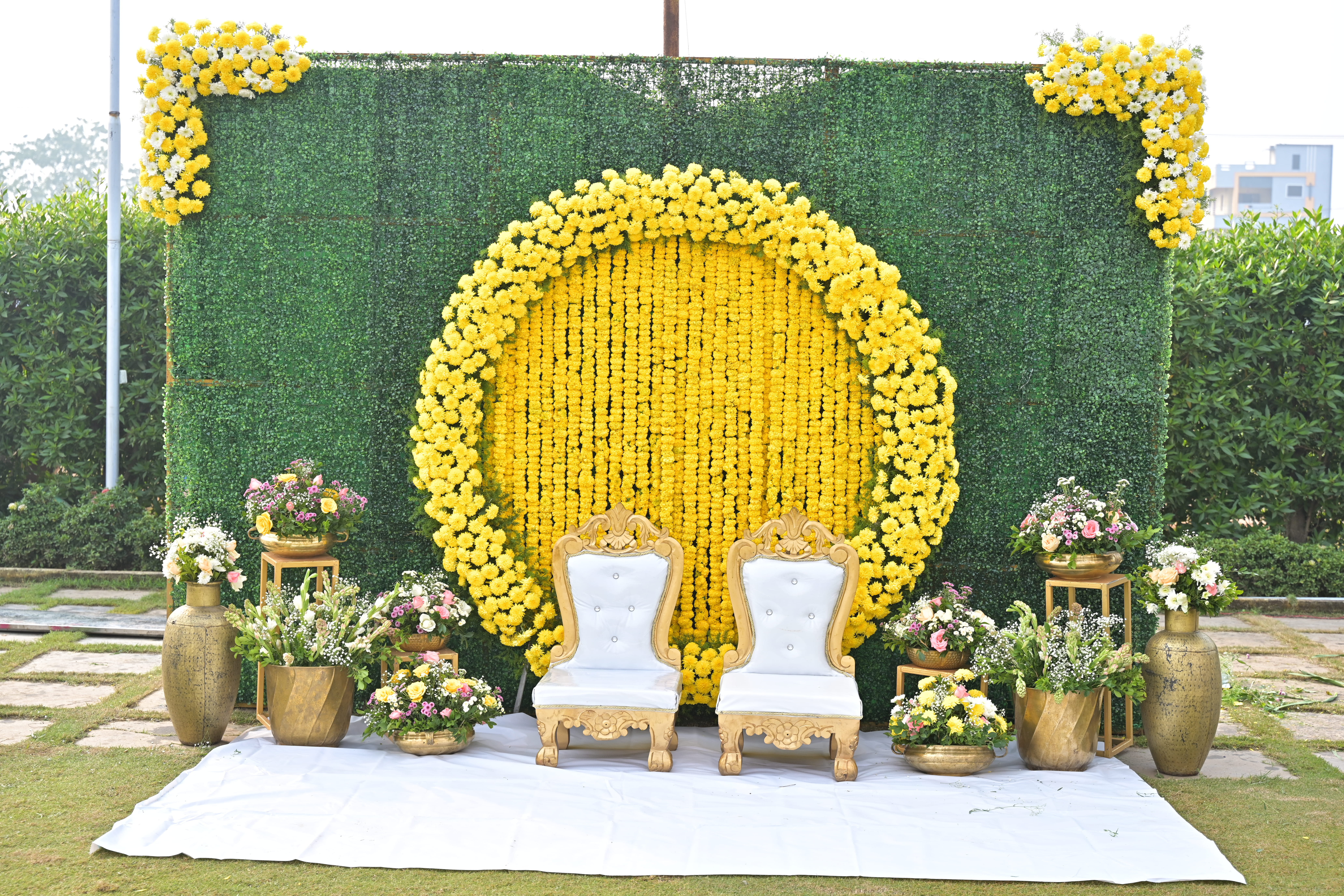 Wedding stage and mandap decor with floral and lighting arrangements, styled and captured by Wow Makers in Hyderabad, India