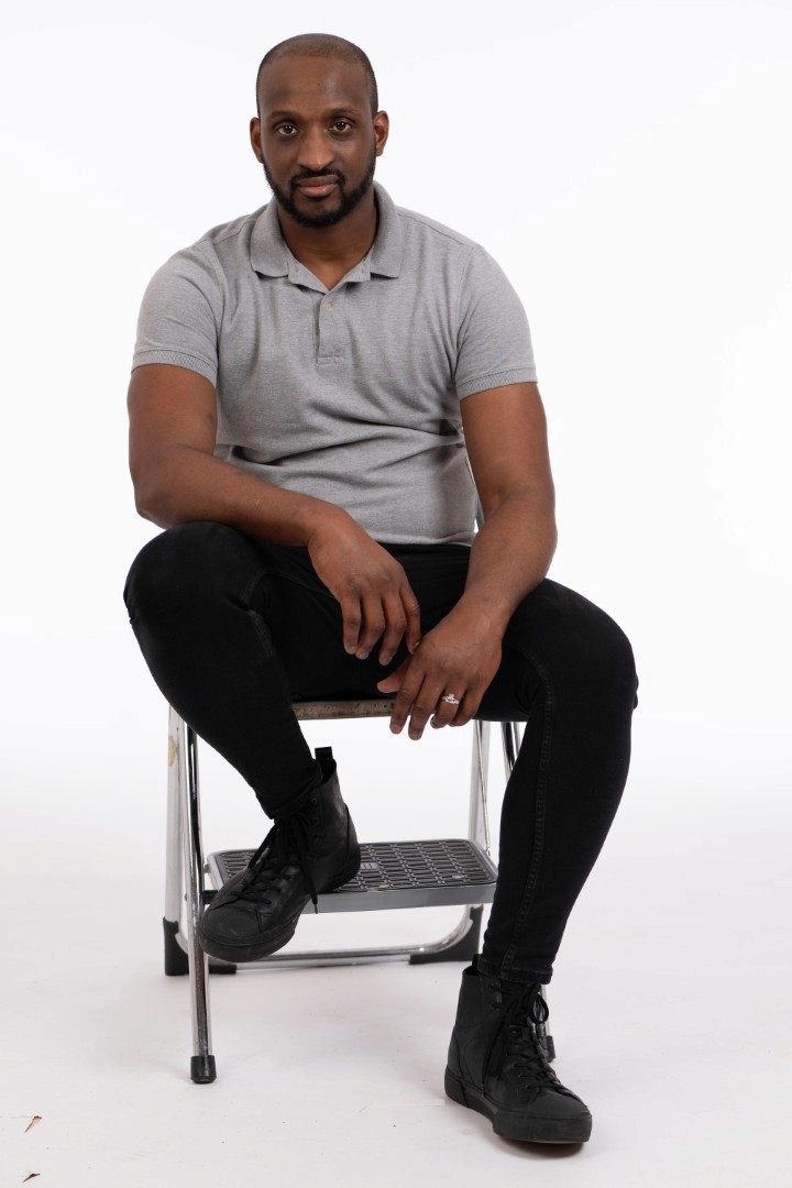 A man having his portrait taken. 