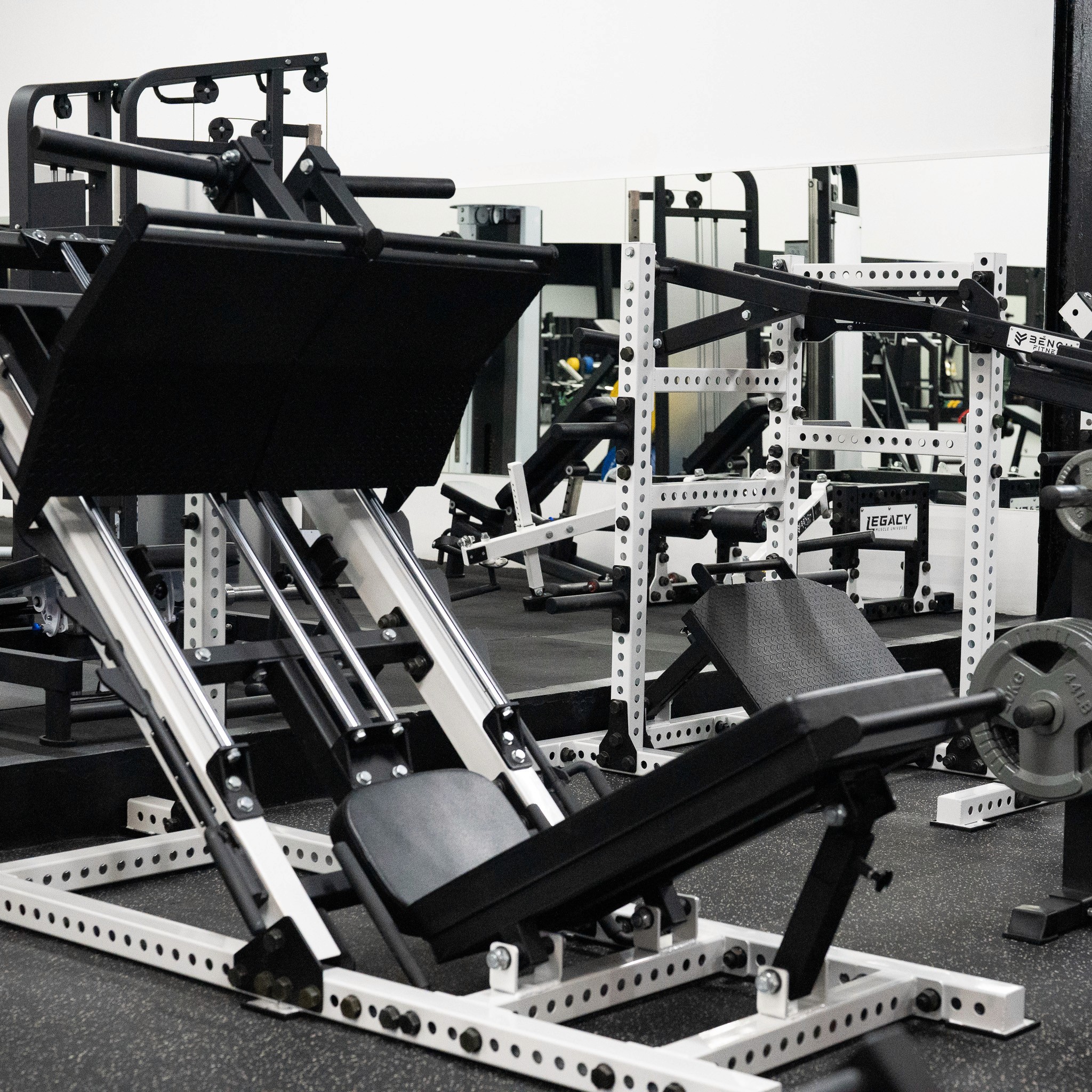 Functional training gear at Legacy Muscle Universe Koh Samui, with kettlebells and battle ropes in a dynamic fitness environment.