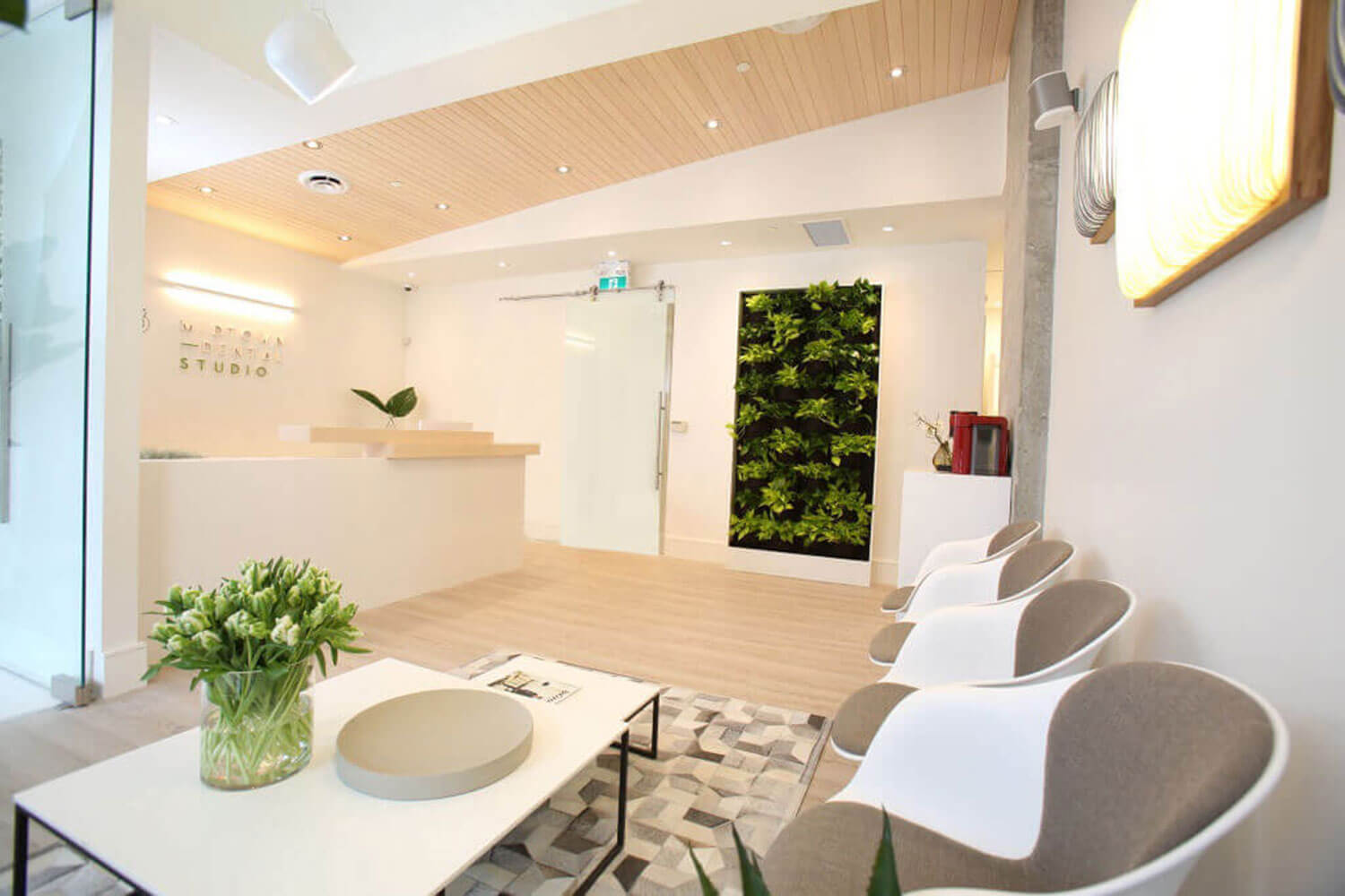 Dental waiting room and receptionist desk at Midtown Dental Studio on Eglinton in Midtown Toronto, Ontario | Best Dentist in Midtown Toronto, Ontario