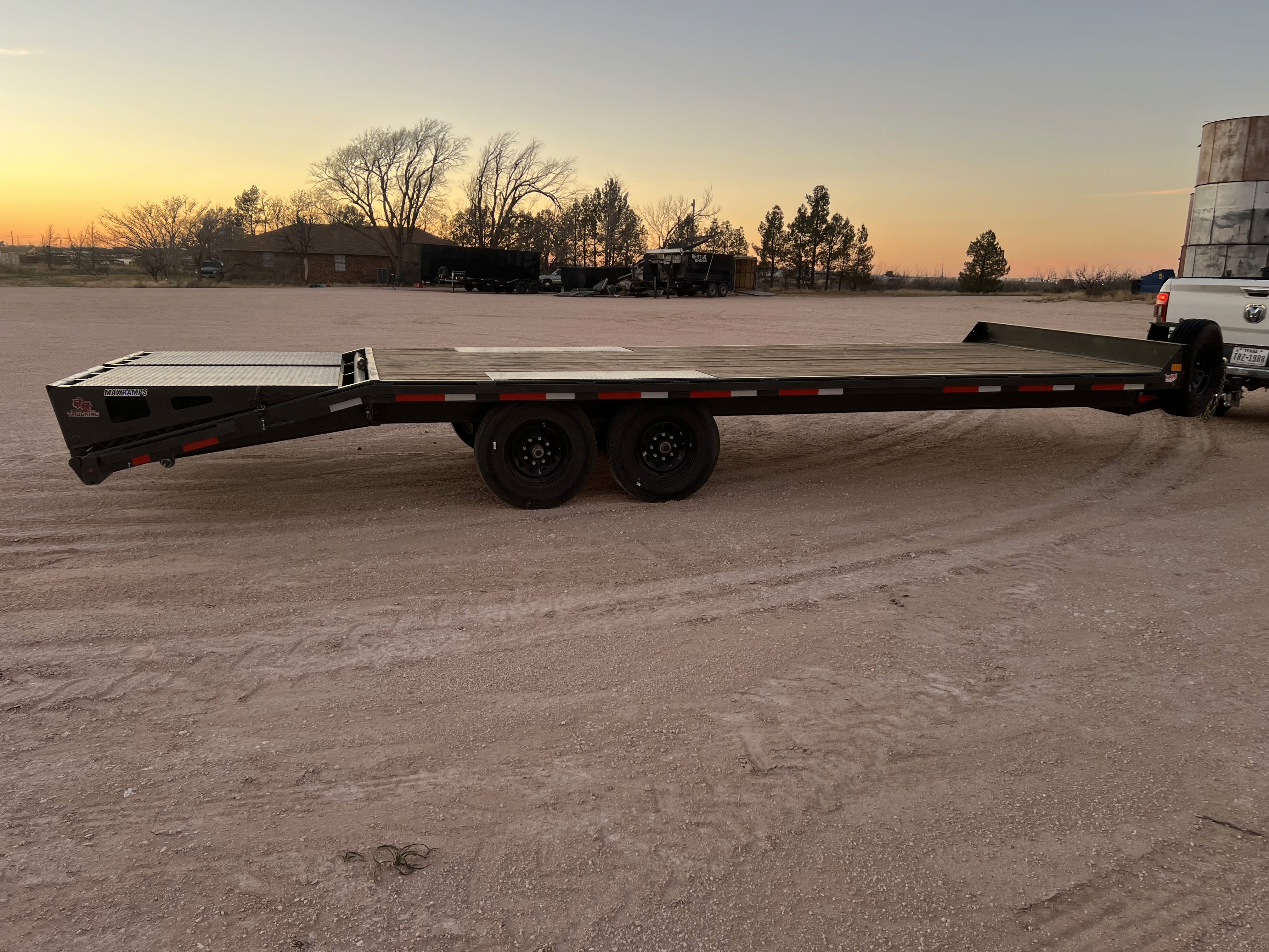 a man in a yellow shirt is working on a roof