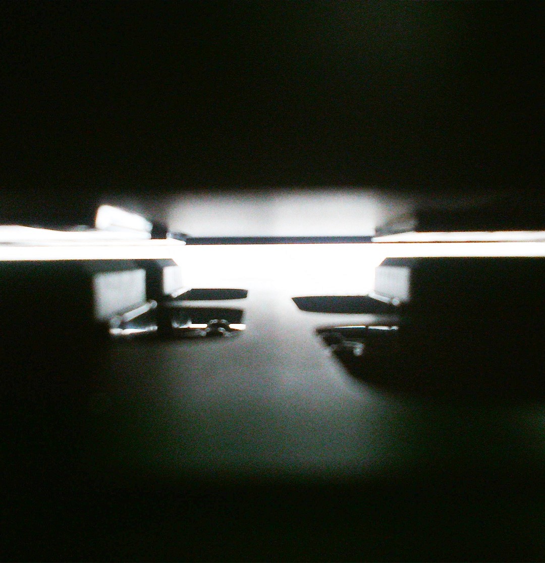 Detailed internal cleaning view 2 of the Manprotek Gravity Pro DTF printer, showing the automated blade and ink management system.