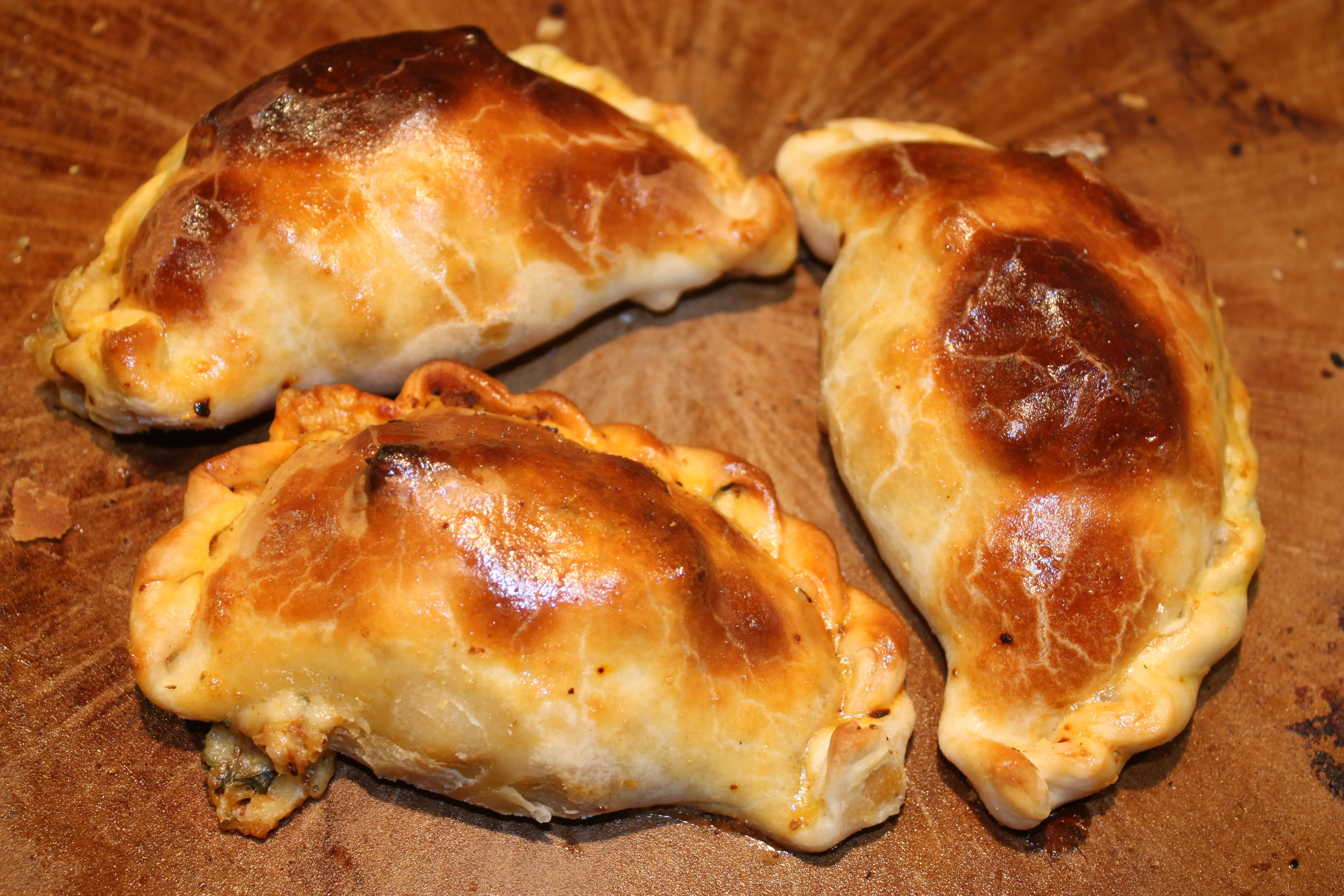 Fresh hand-crafted artisan empanadas with chimichurri sauce by Scorpion Chef Vancouver Island