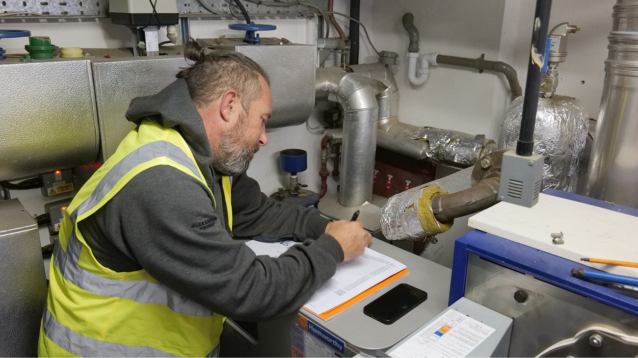 Barry Turner and Son's Site Manager doing a boiler inspection and part change for a Primary School in London