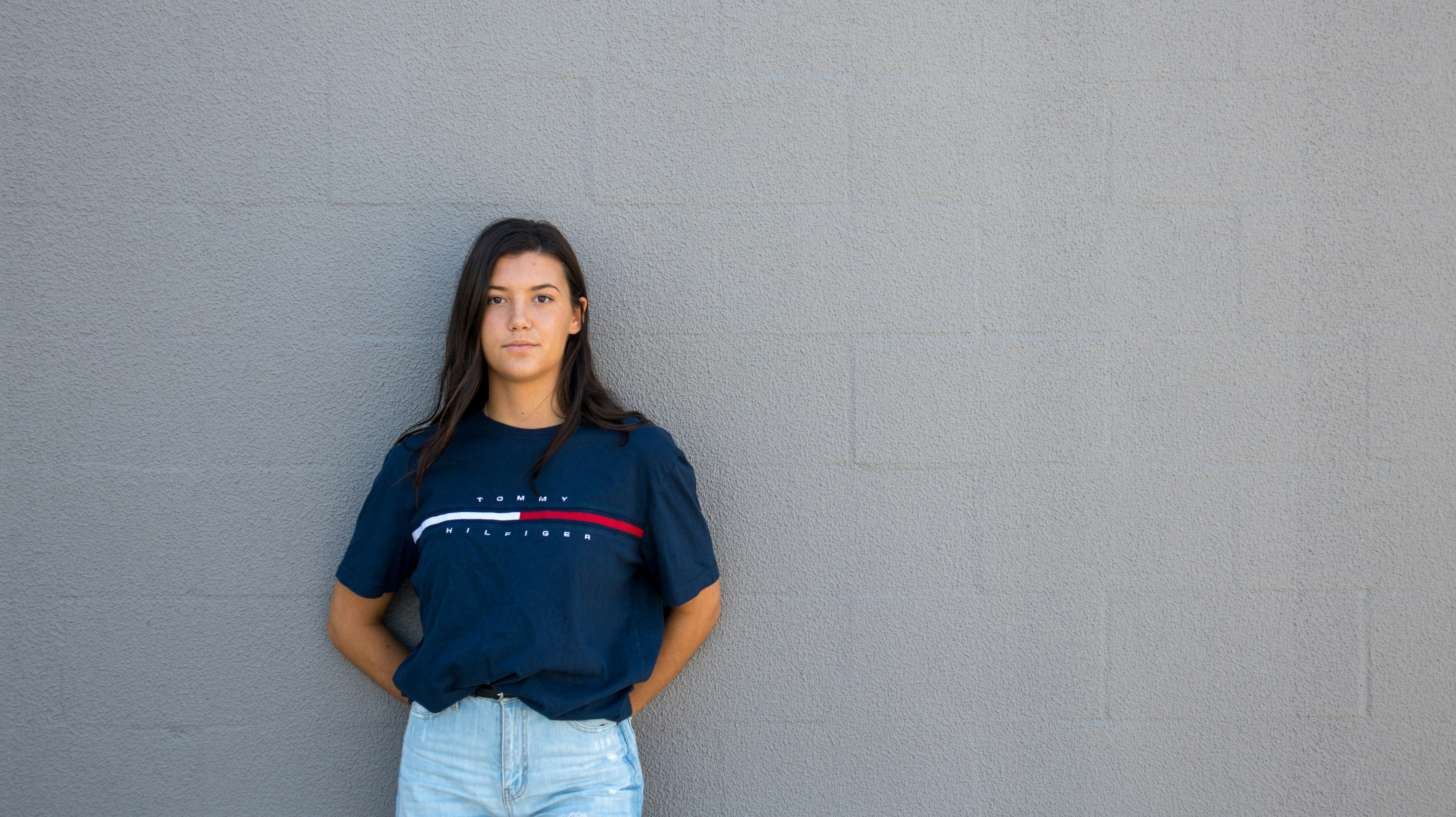 woman in blue shirt - Preppy Style