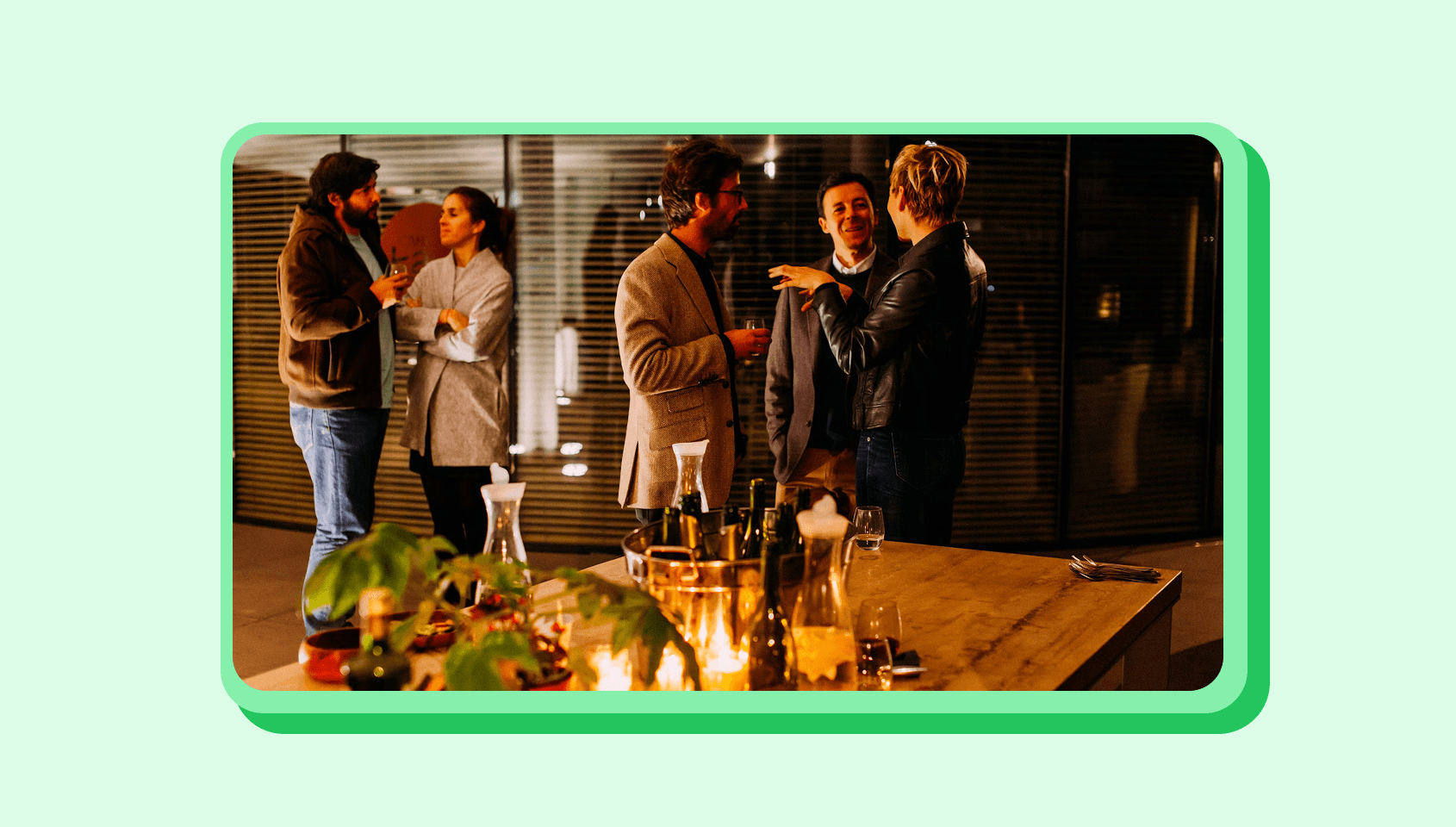 A group of people chatting in a networking event.