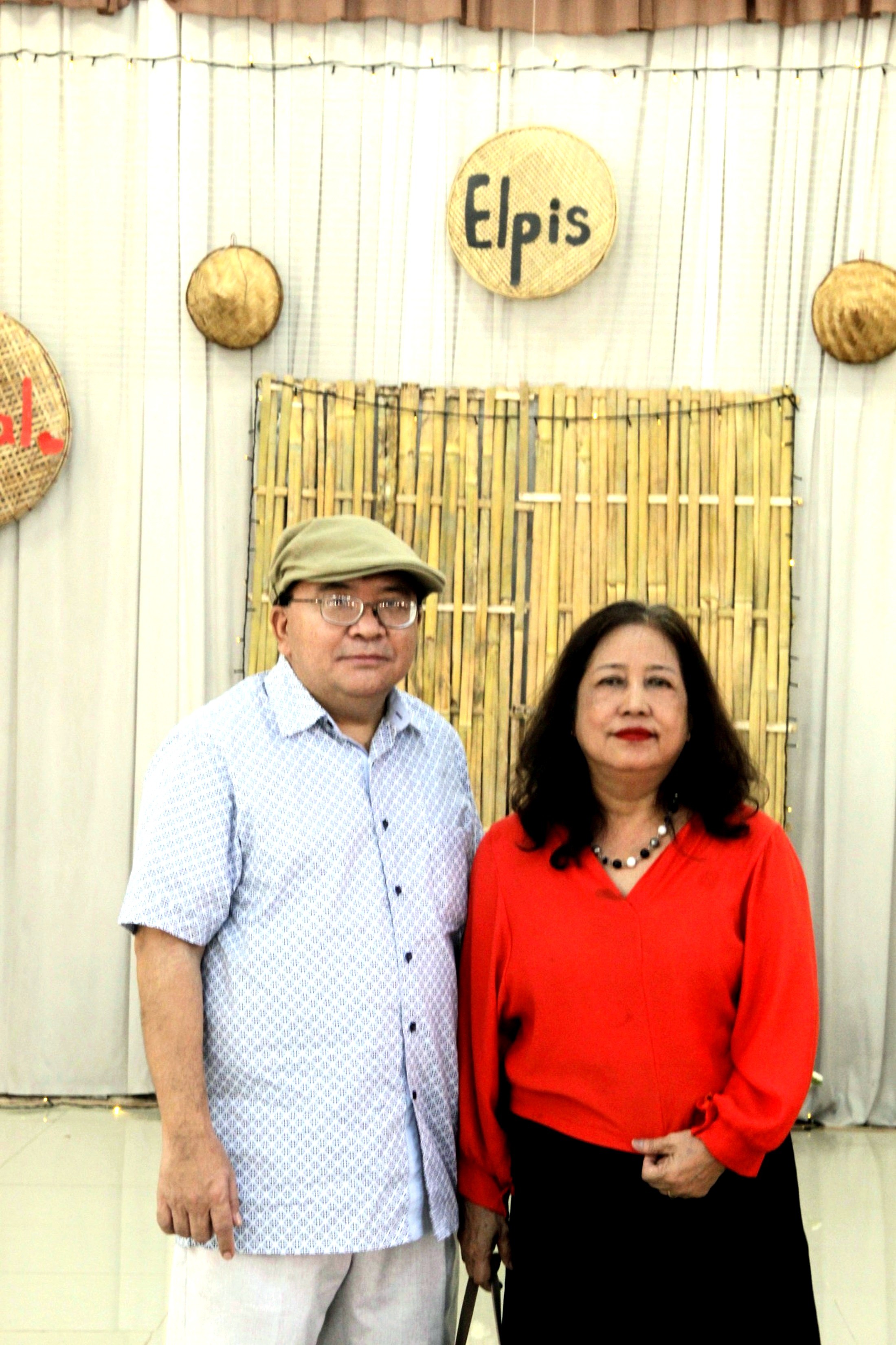 Dr. Timothy Sui Lian Mang, founder of Elpis International School, with his wife Lily Mang.