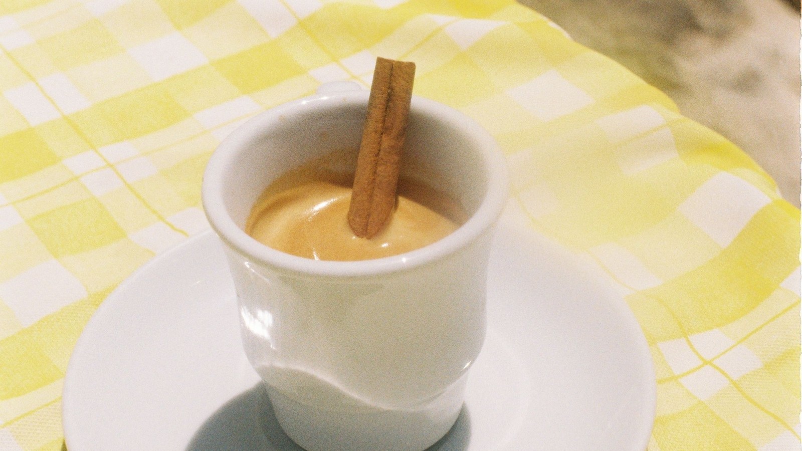Traditional Portuguese café drink with cinnamon
