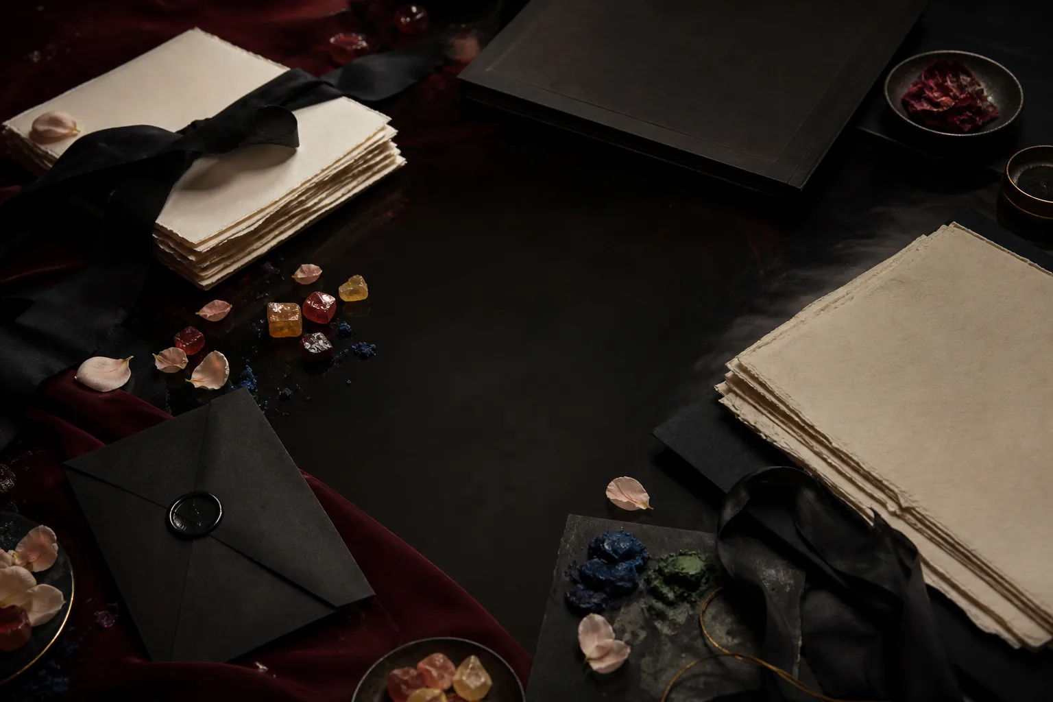 Abstract empty literary archive composed from paper, fabric, petals, translucent color, and pigment marks.