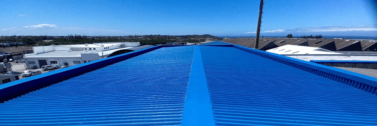 Waterproofed roof sprayed blue