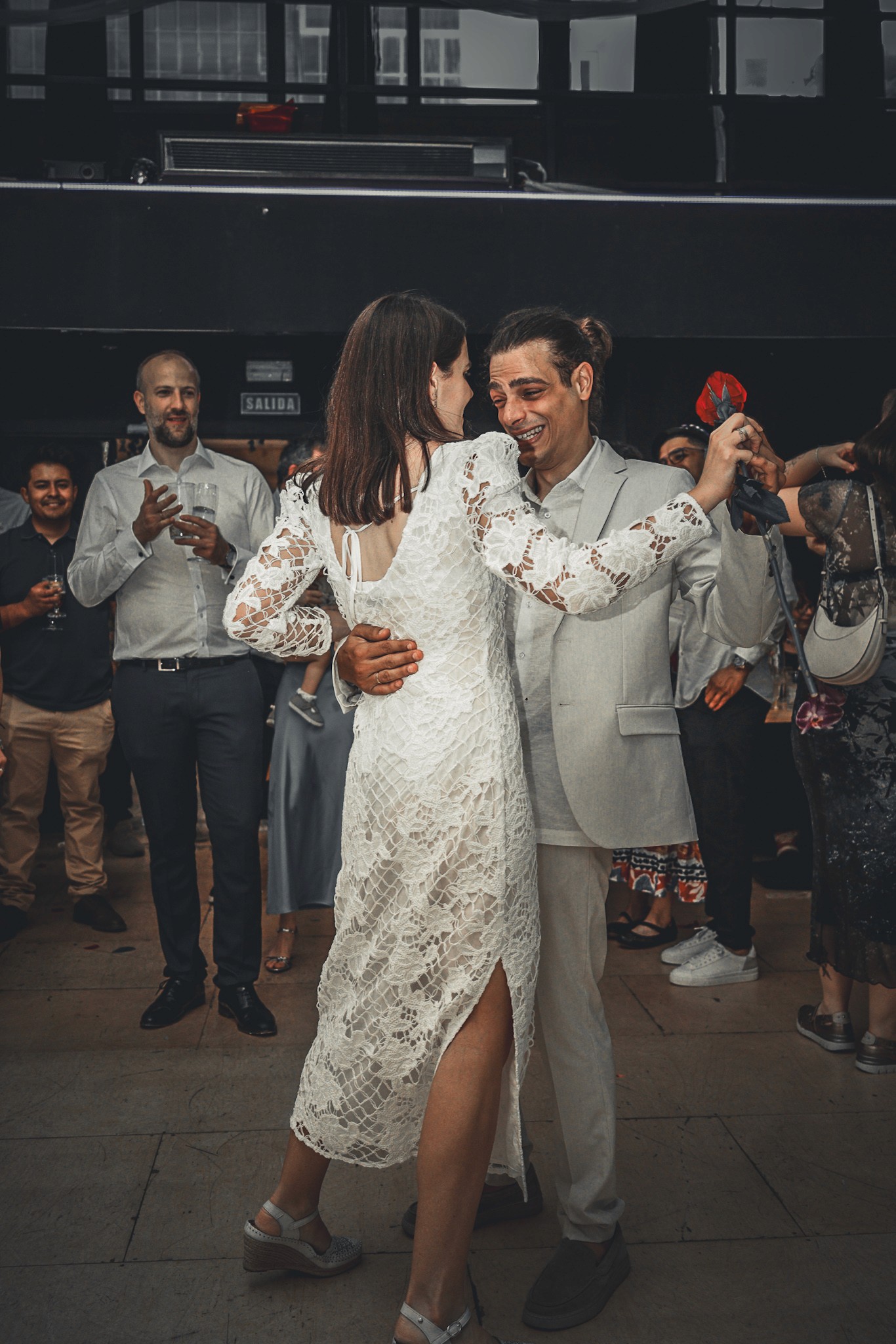 A close-up shot of a handcrafted welcome cocktail served at a Mediterranean hotel patio
