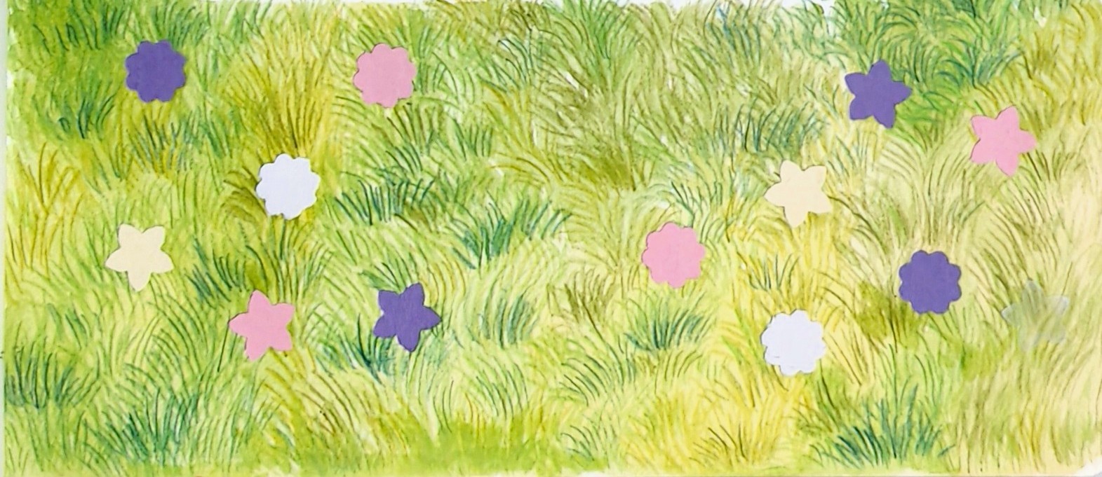A hand drawn mixed media image of grass in watercolour and colour pencils with varied colours. Small paper flowers in pink, purple and white are laid out on top.