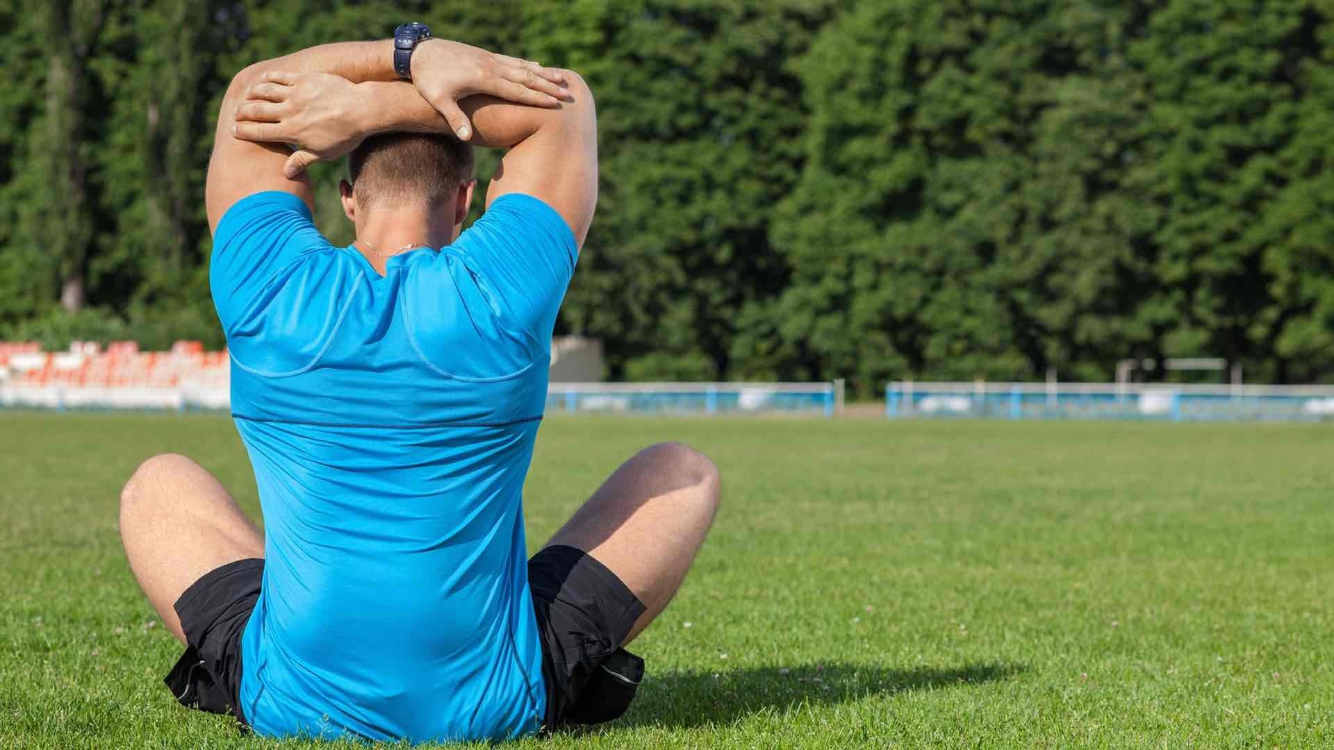 a man doing shoulder stretch