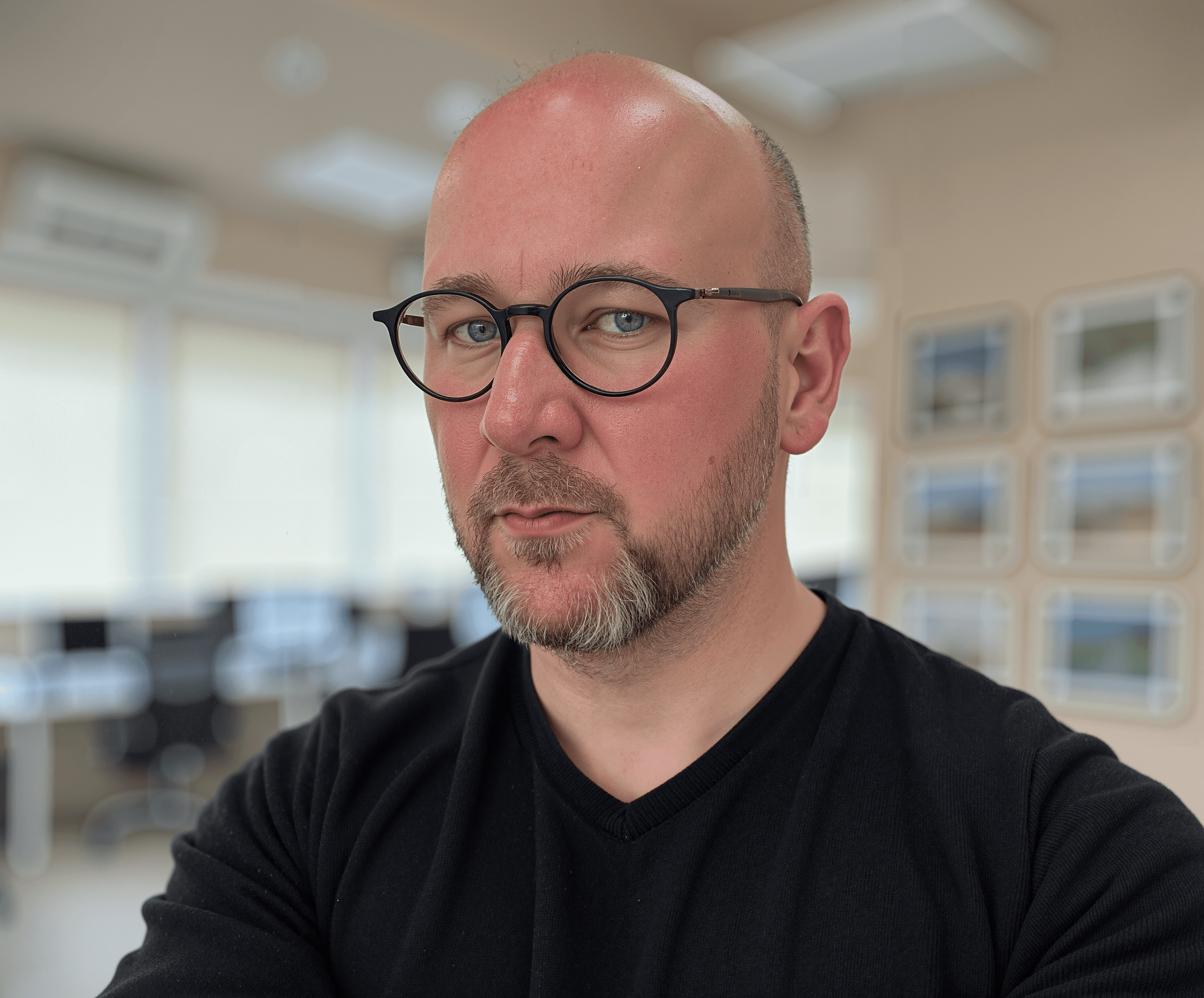 Phiotographer looking at the camera