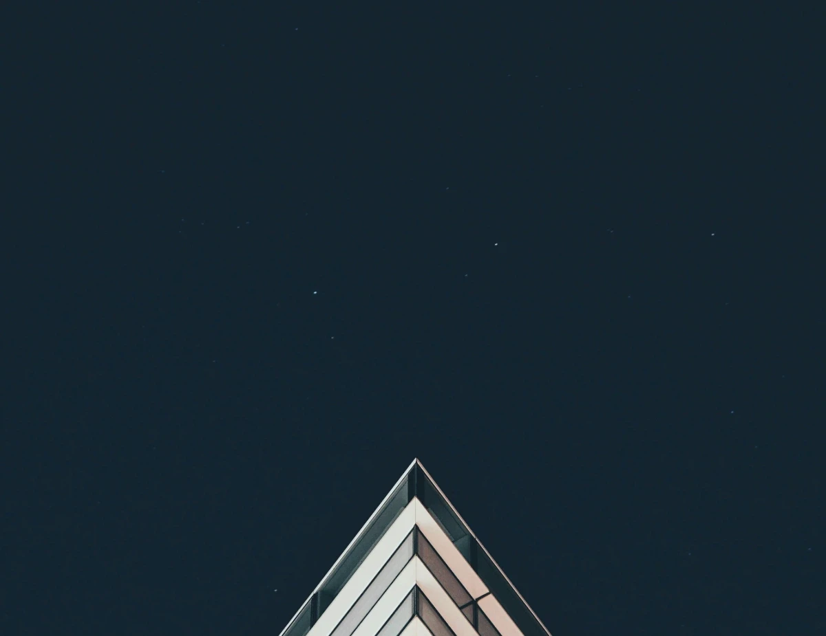 white building under stars