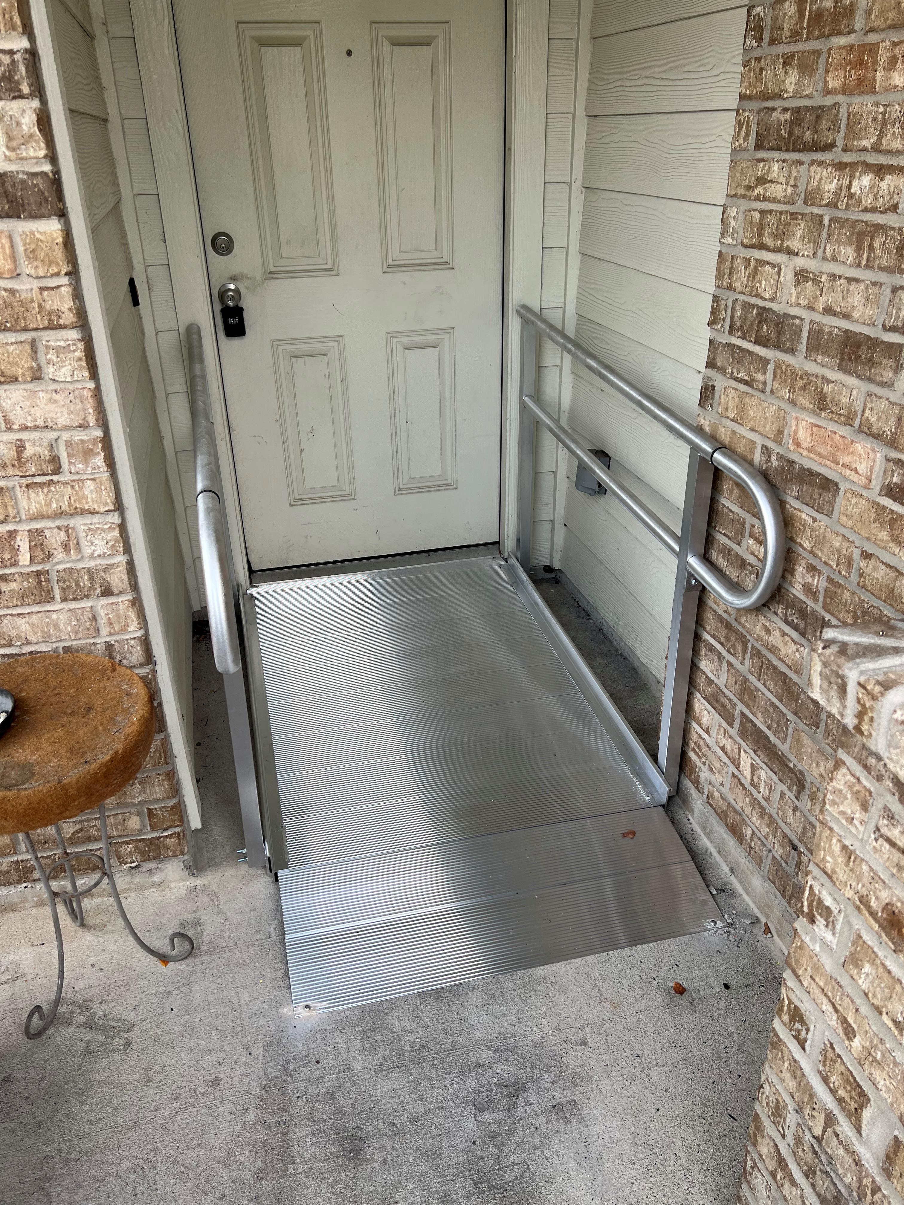 Aluminum modular wheelchair ramp installed for a veteran