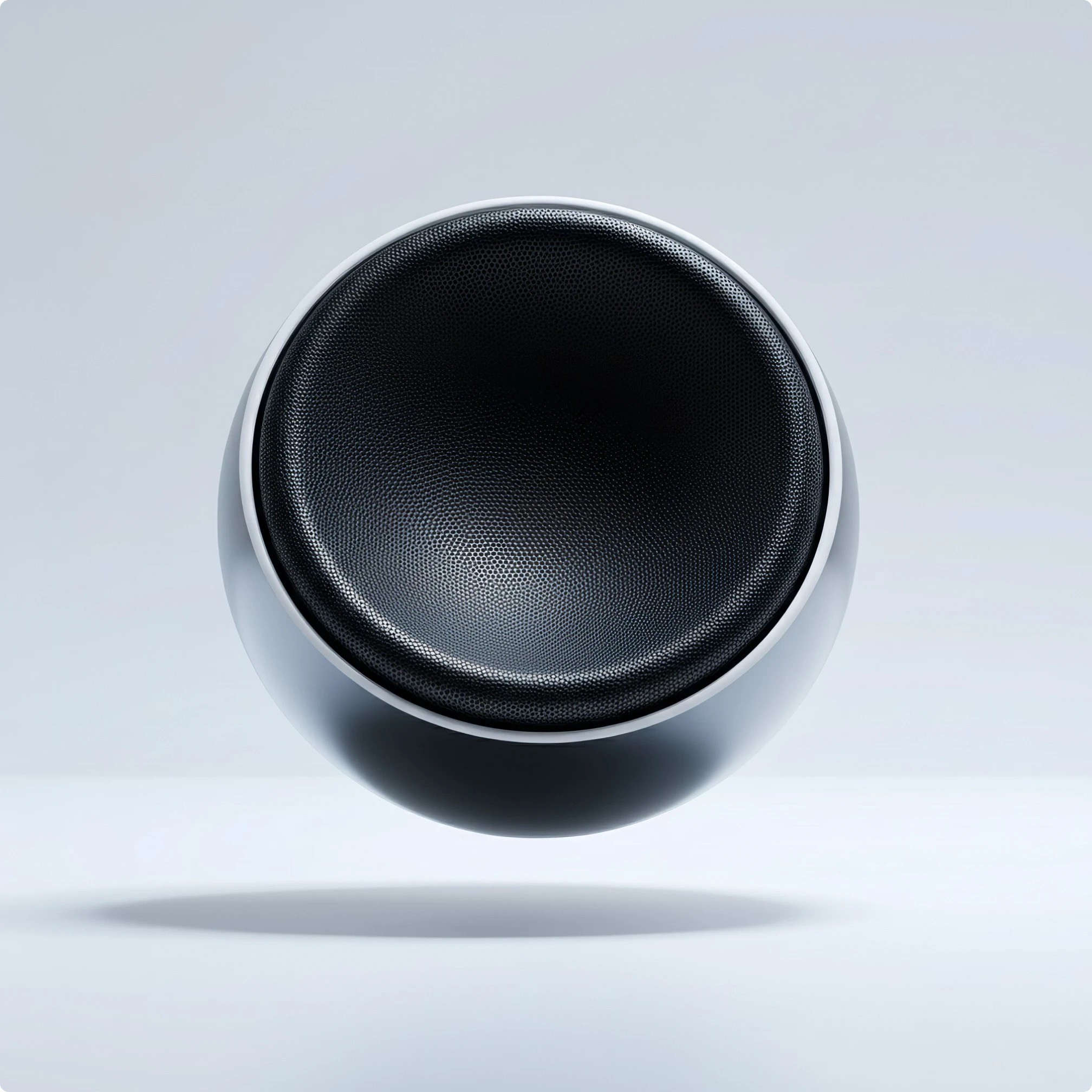 Modern table lamp with a black base and white shade casting a warm glow on a neutral background.