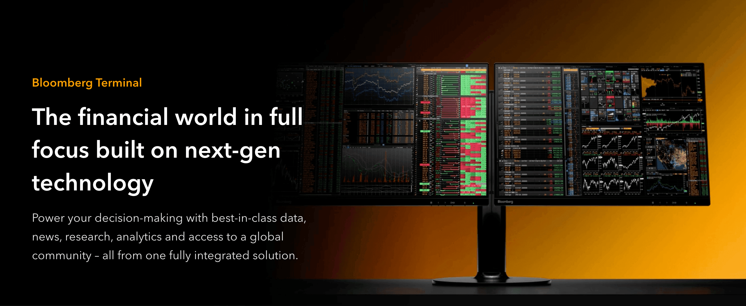 Bloomberg Terminal three-monitor setup displaying real-time market data, financial charts, and global analytics