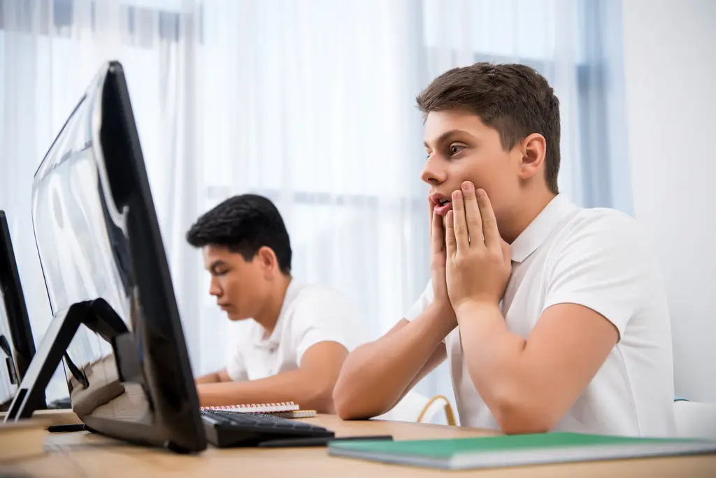 Student discovering browser restrictions during secure online exam with AssessPrep Lockdown mode