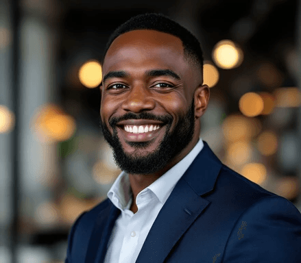 A smiling man in a suit